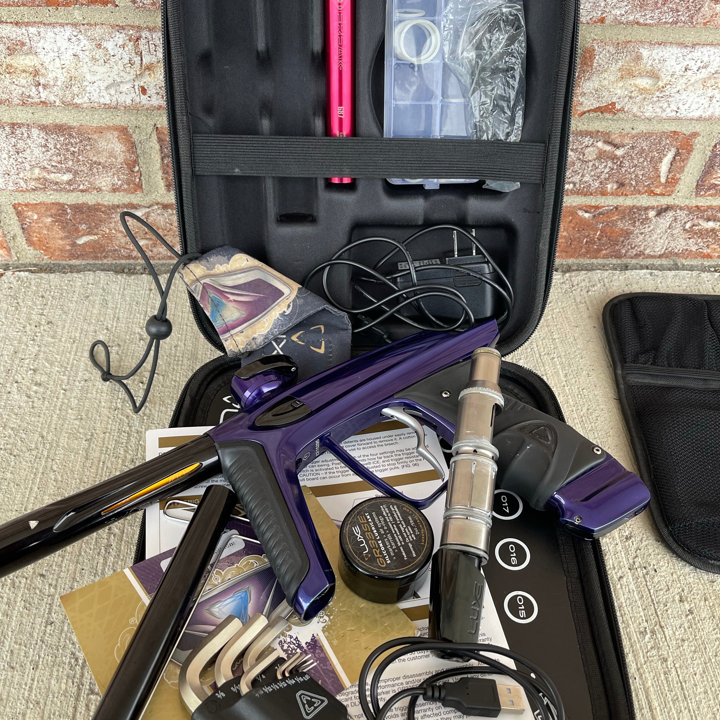 Used DLX Luxe Ice Paintball Gun - Purple / Black
