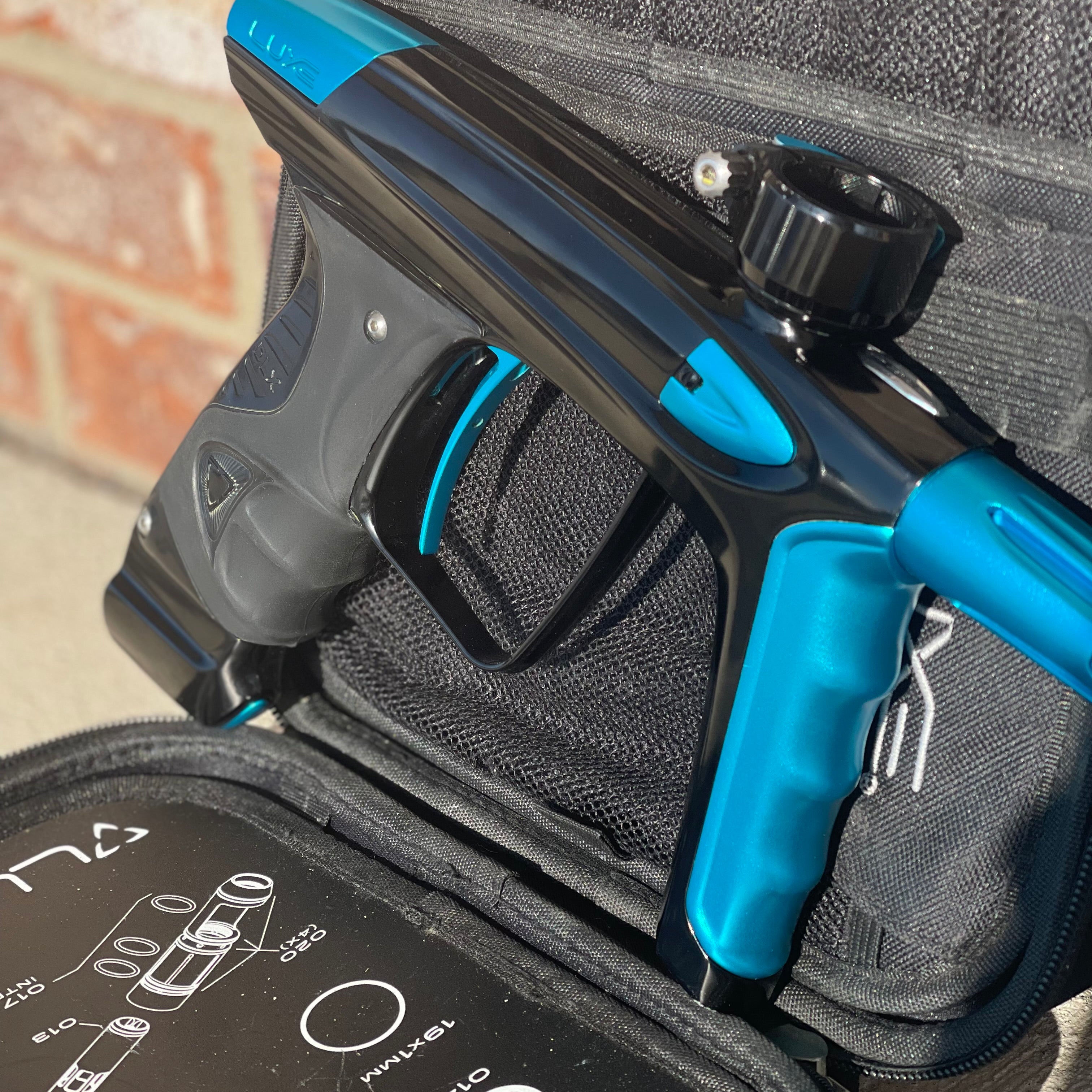 Used DLX Luxe Ice Paintball Gun - Polished Black / Dust Teal
