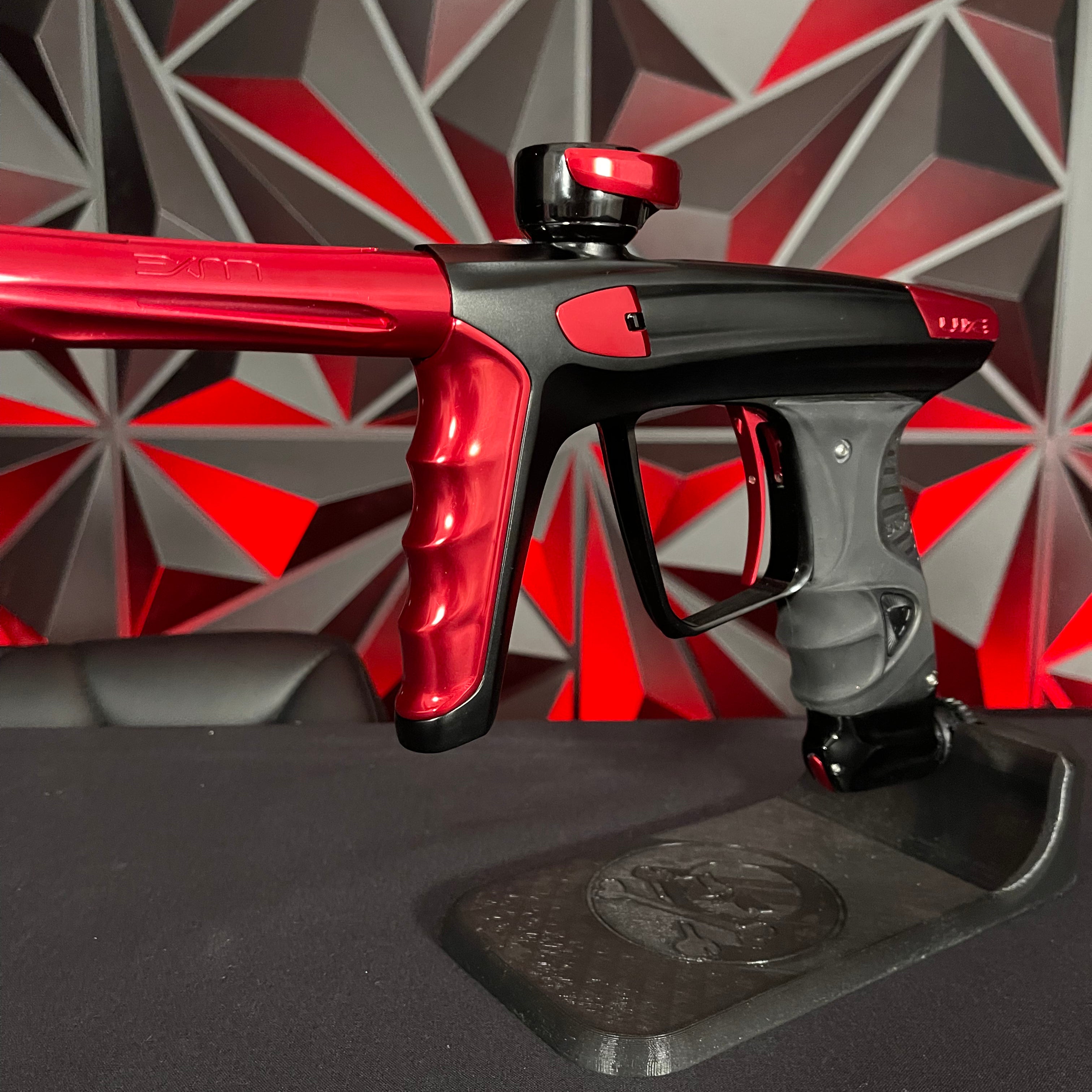 Used DLX Luxe X Paintball Gun - Dust Black Body/Gloss Trigger Frame/Red Accents