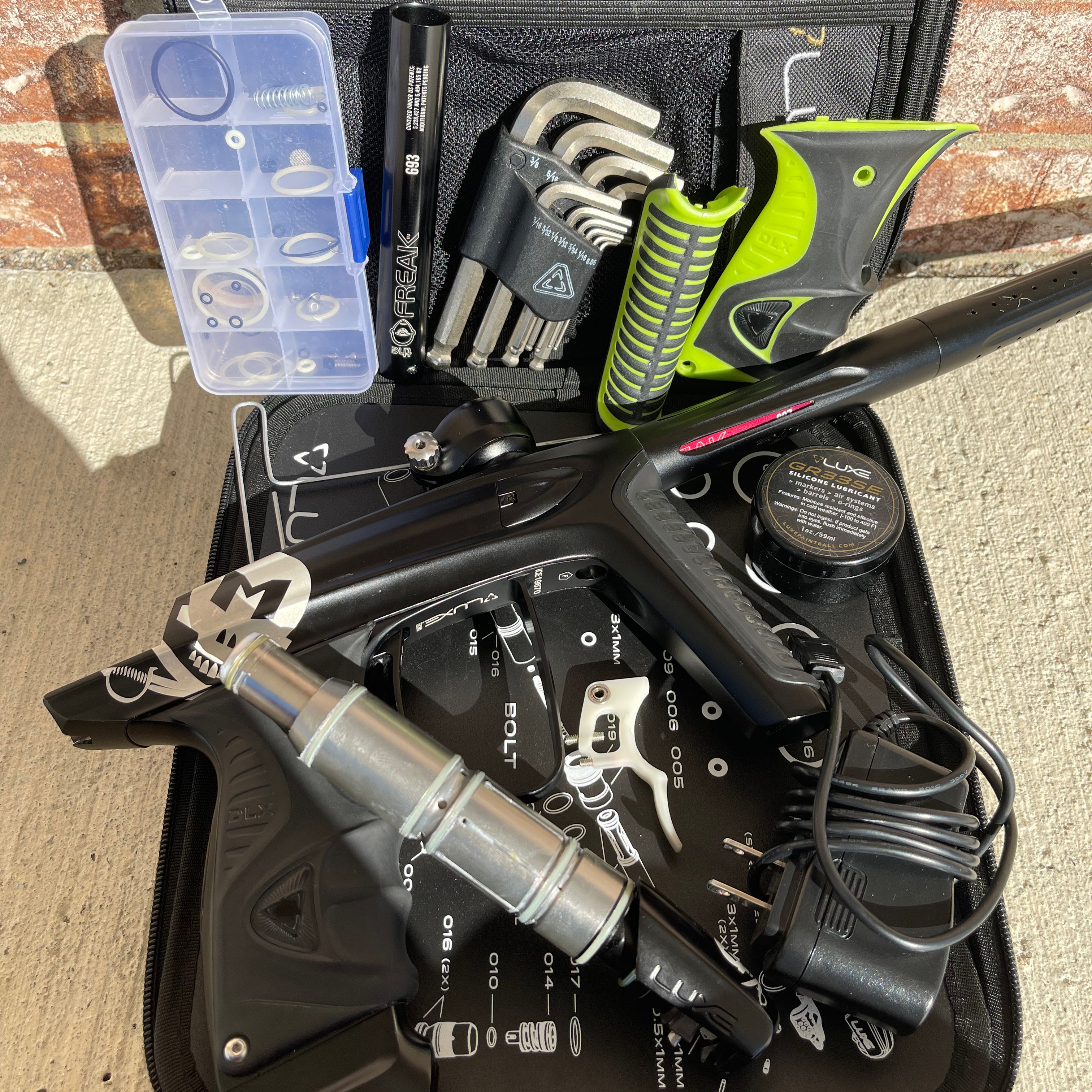 Used DLX Luxe Ice Paintball Gun - LE Mutiny Dust Black w/ Black and Green Grip Kit, Deuce Trigger