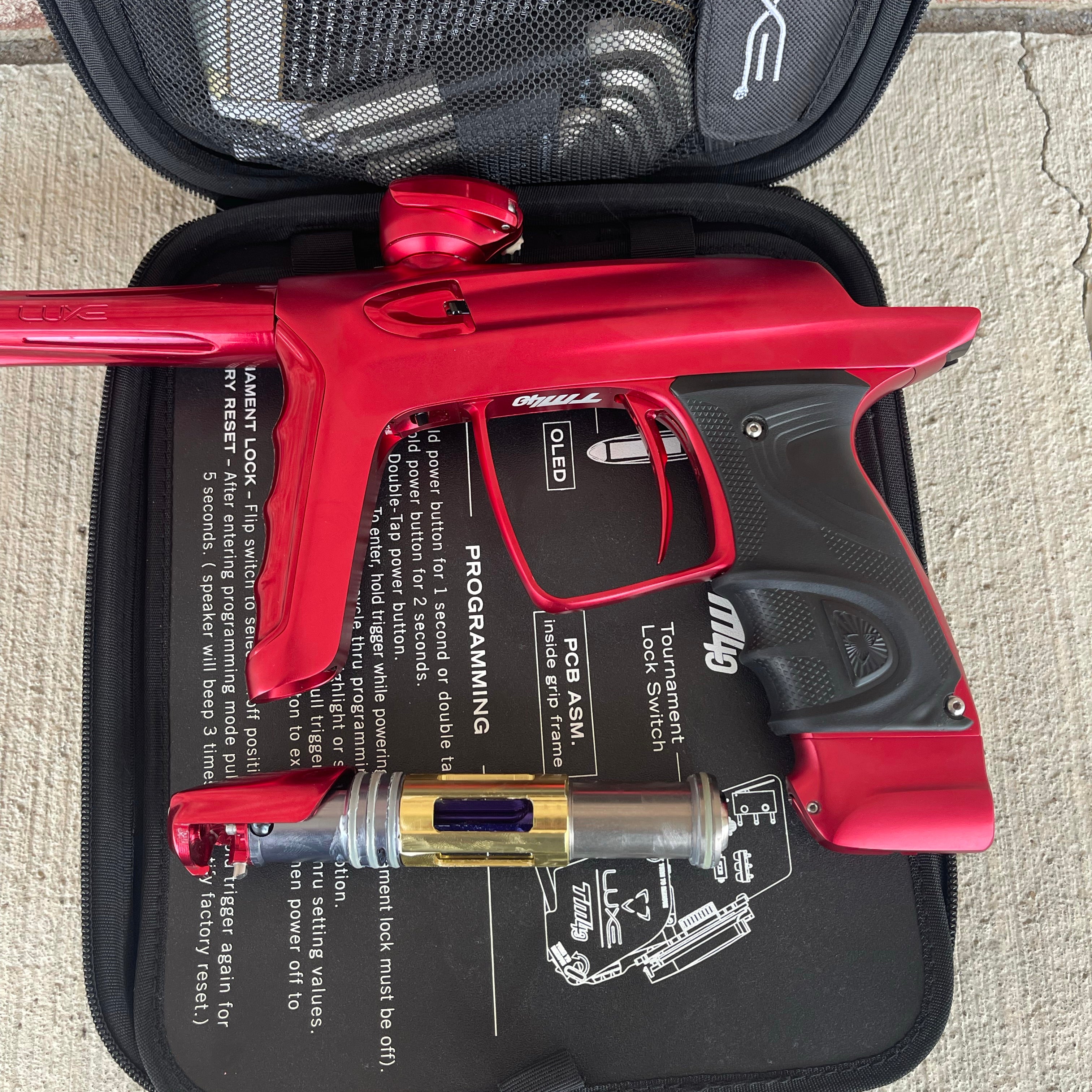 Used DLX Luxe TM40 Paintball Gun - Dust Red / Gloss Red