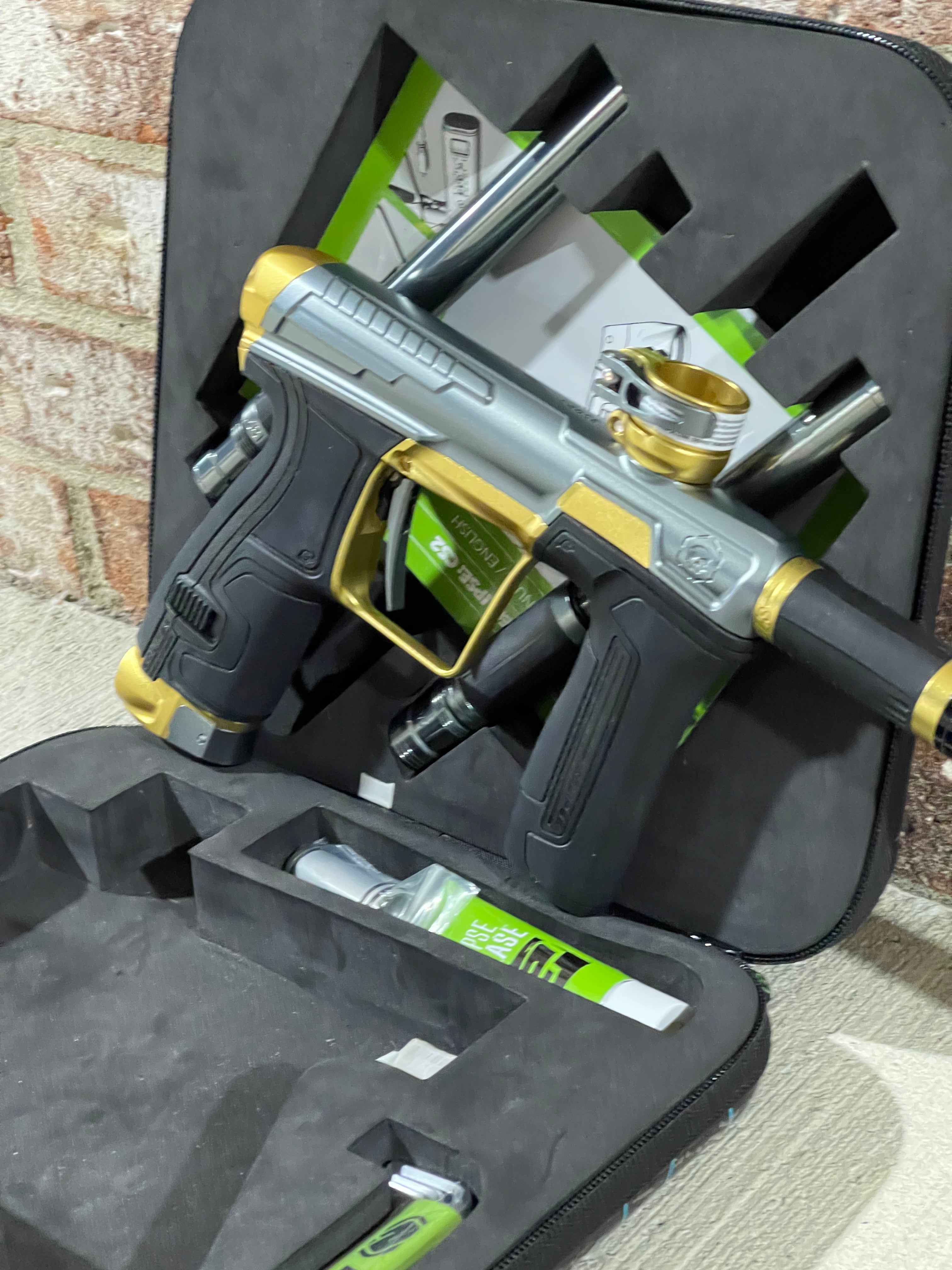 Used Infamous / Planet Eclipse CS2 Paintball Gun - Grey / Gold w/ 3 FL Inserts