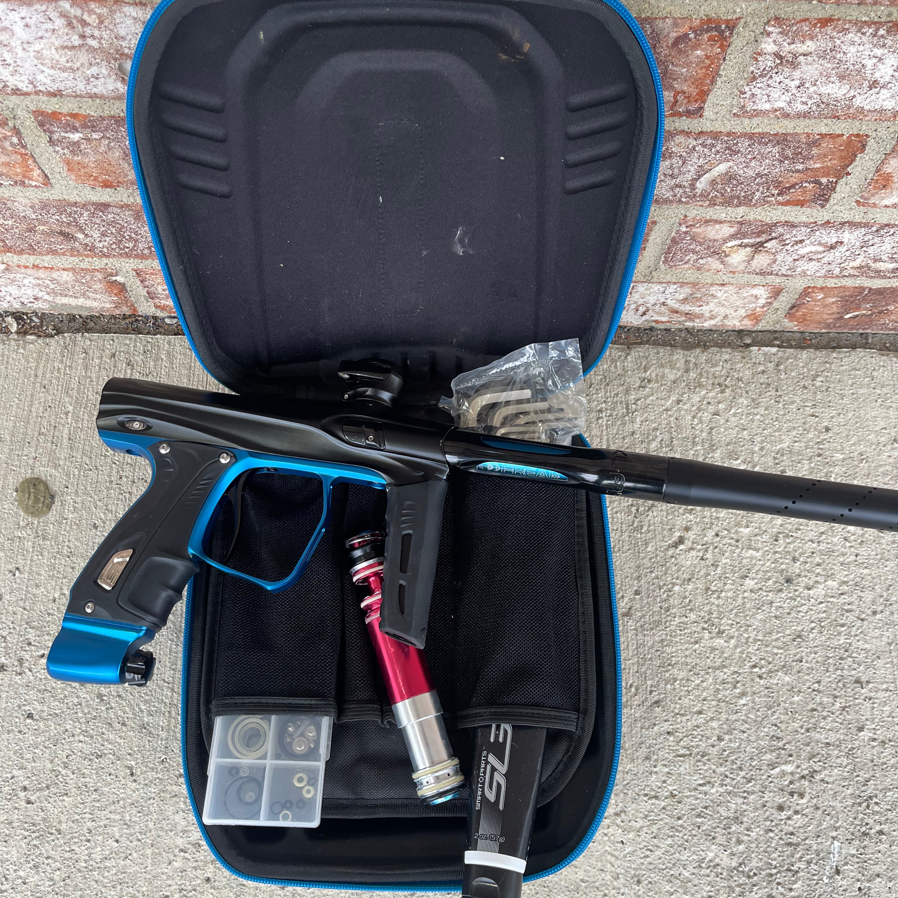 Used Shocker XLS Paintball Gun - Dust Black w/ Blue Trigger Frame