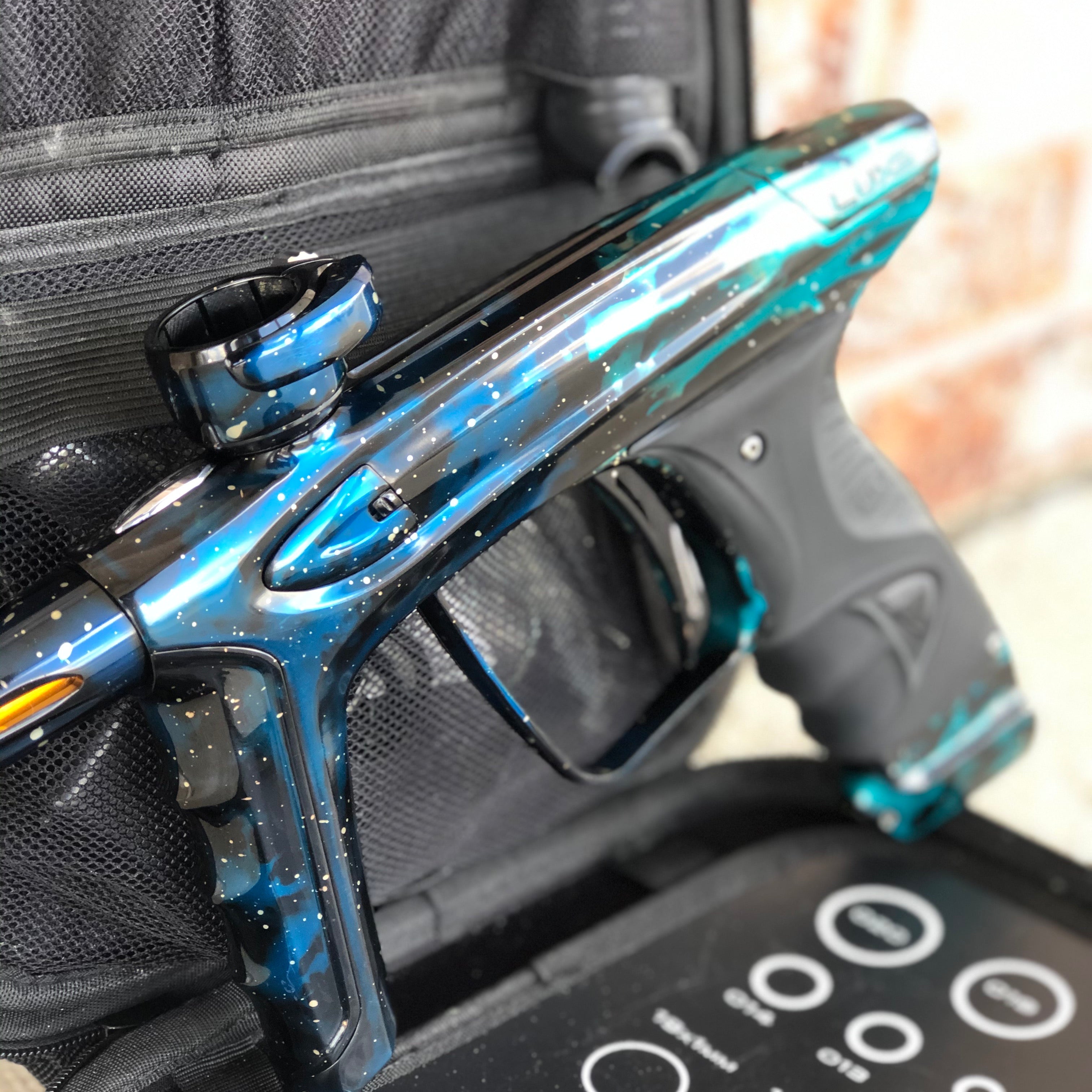 Used DLX Luxe Ice Paintball Gun - Galaxy Teal/Black/Blue