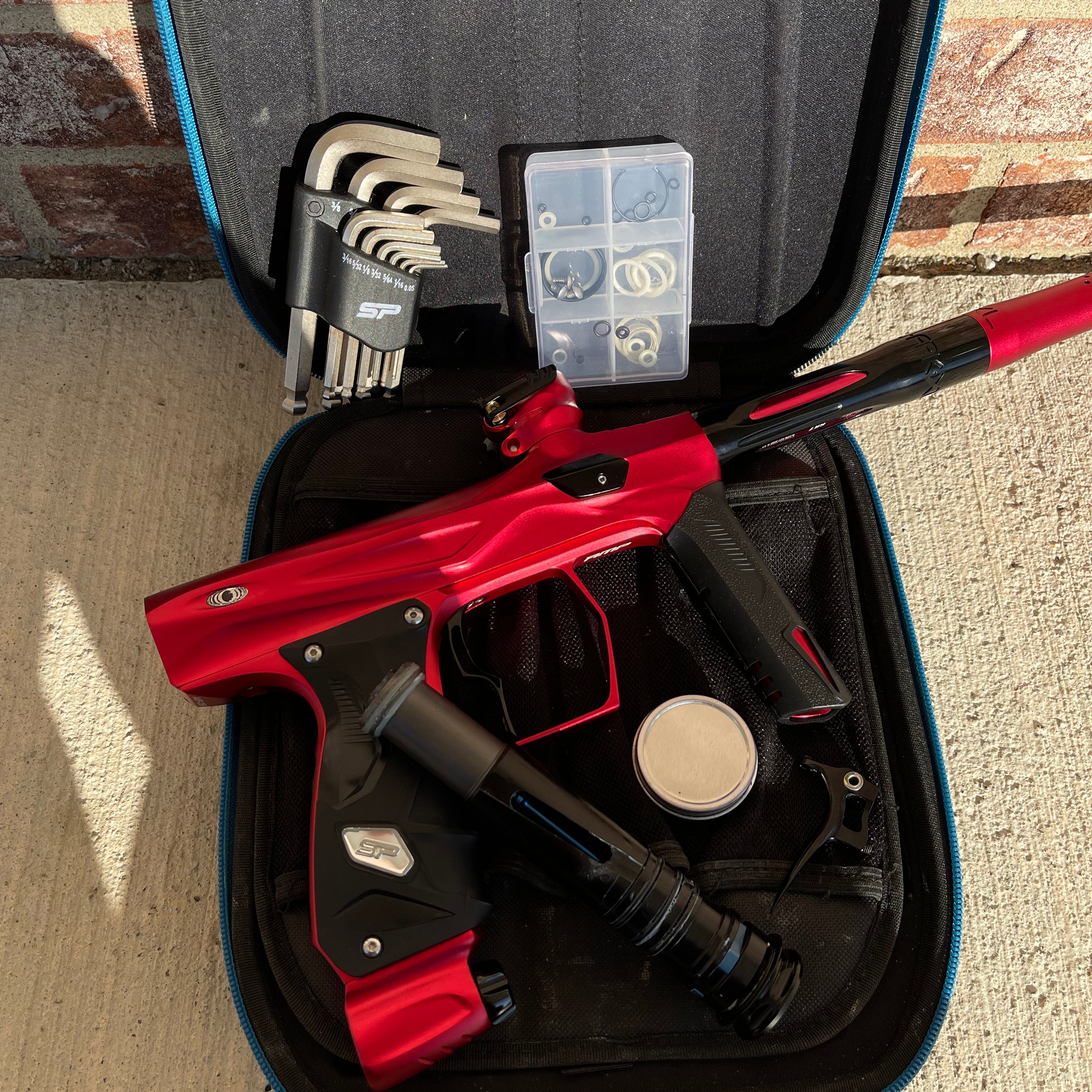 Used Shocker AMP Paintball Gun - Dust Red w/ Infamous Deuce Trigger
