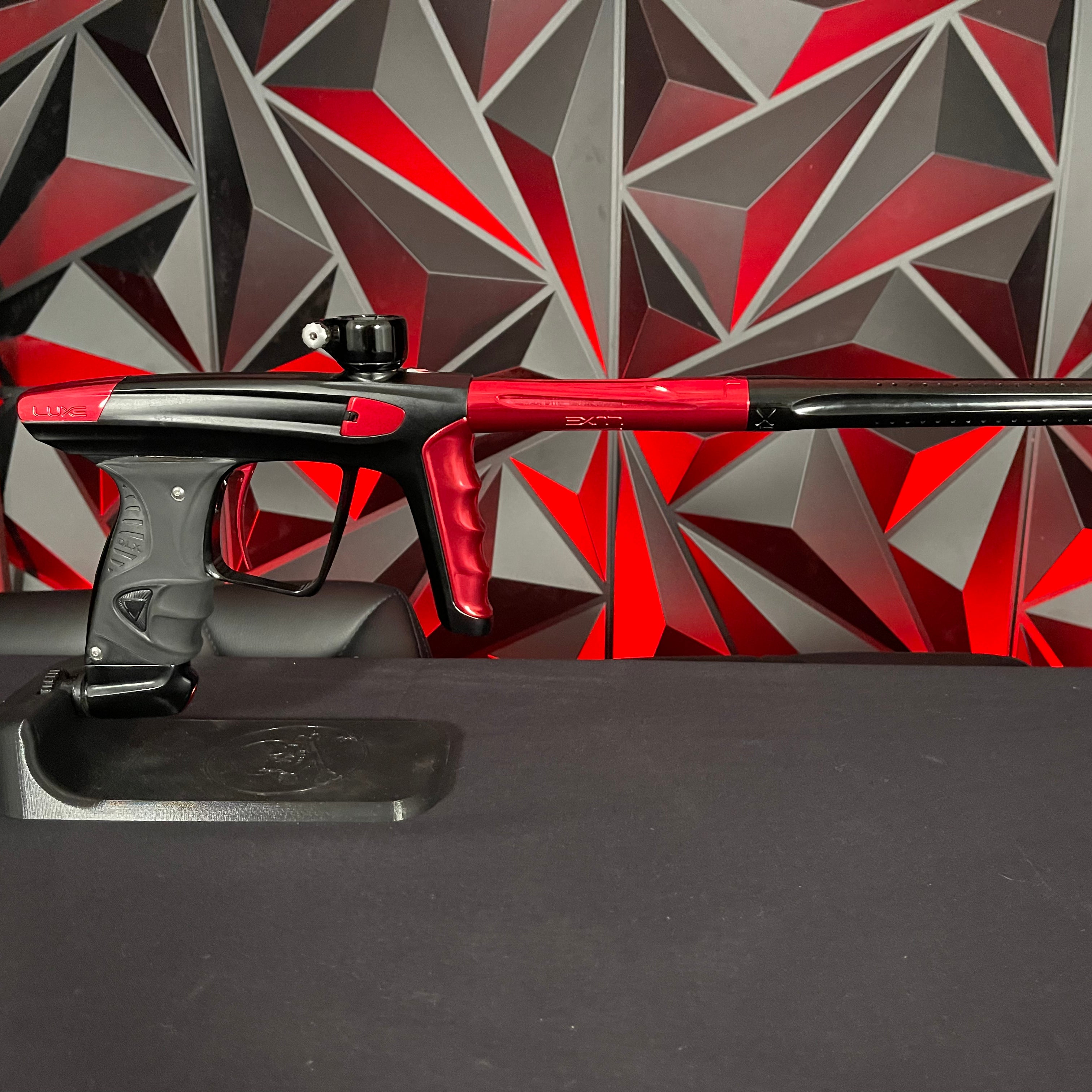 Used DLX Luxe X Paintball Gun - Dust Black Body/Gloss Trigger Frame/Red Accents