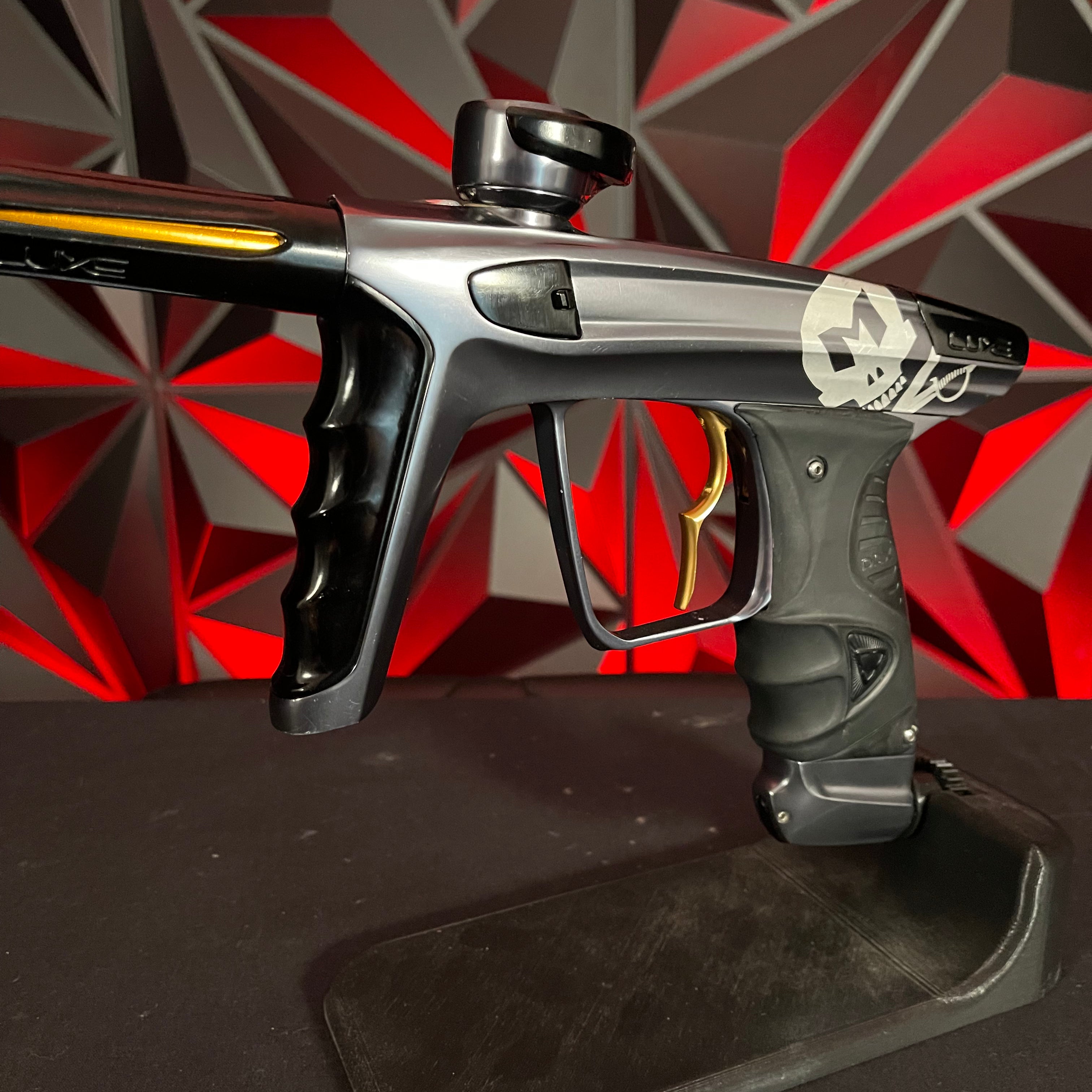 Used DLX Luxe X Paintball Gun - Polished Pewter w/ Infamous Gold Deuce Trigger