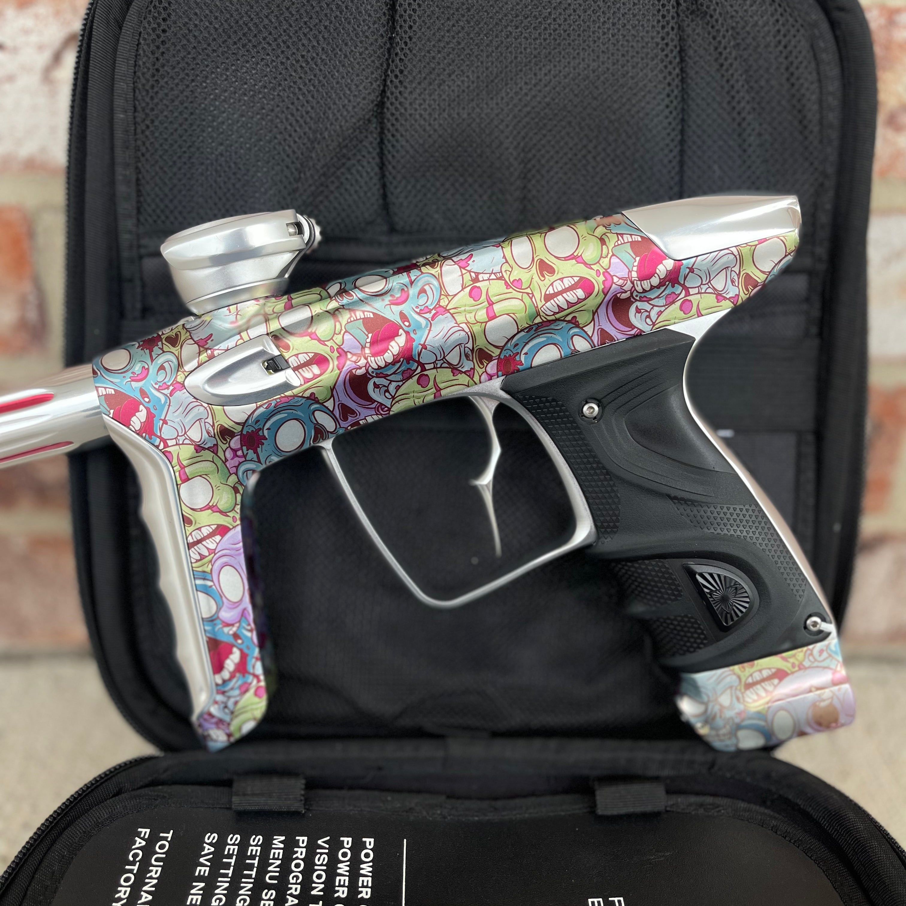 Used DLX Luxe TM40 Paintball Gun - LE Zombie Edition w/Silver Deuce Trigger & Wireless Charger