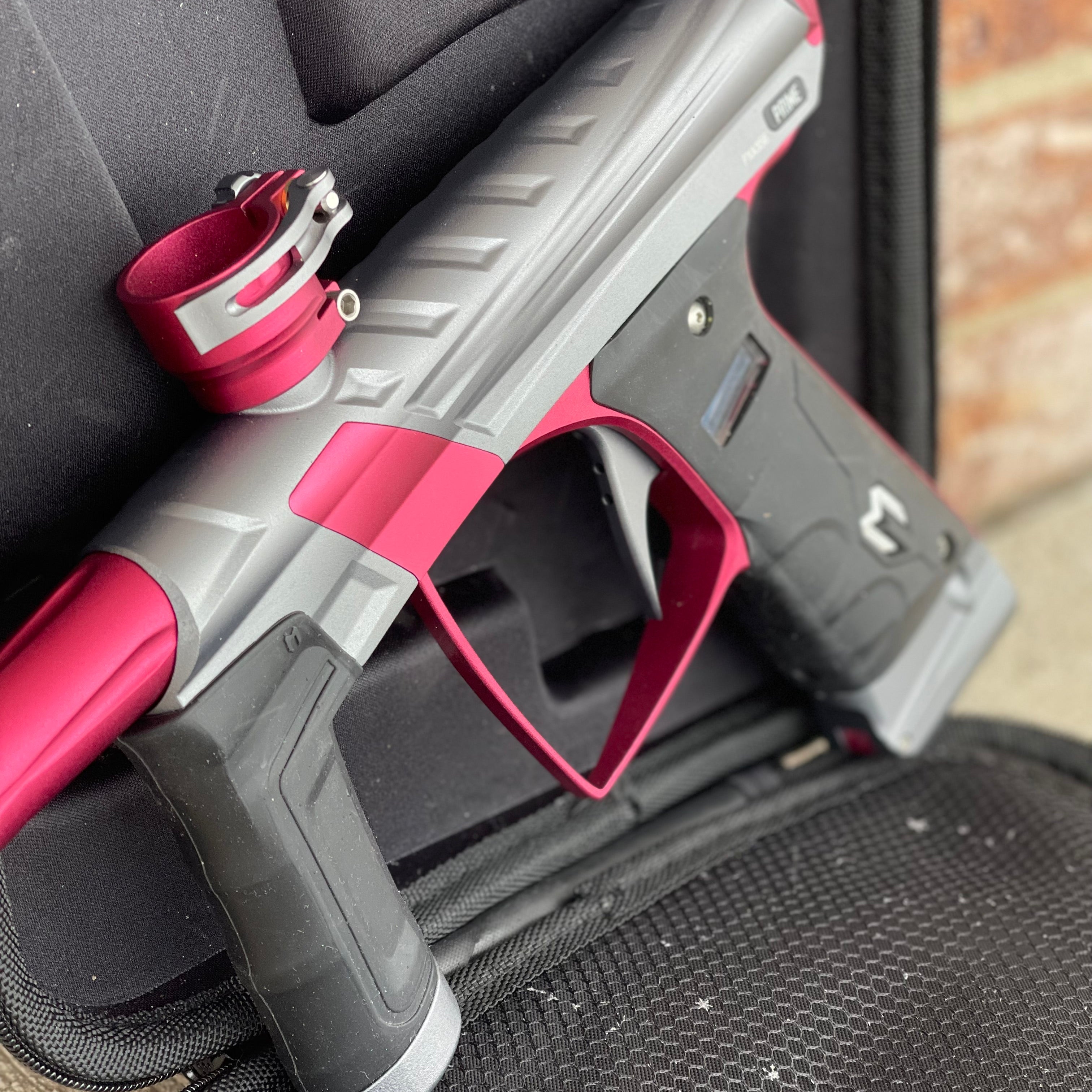 Used MacDev Prime XTS Paintball Gun - Dust Grey / Dust Red w/ additional Stock Deuce Trigger