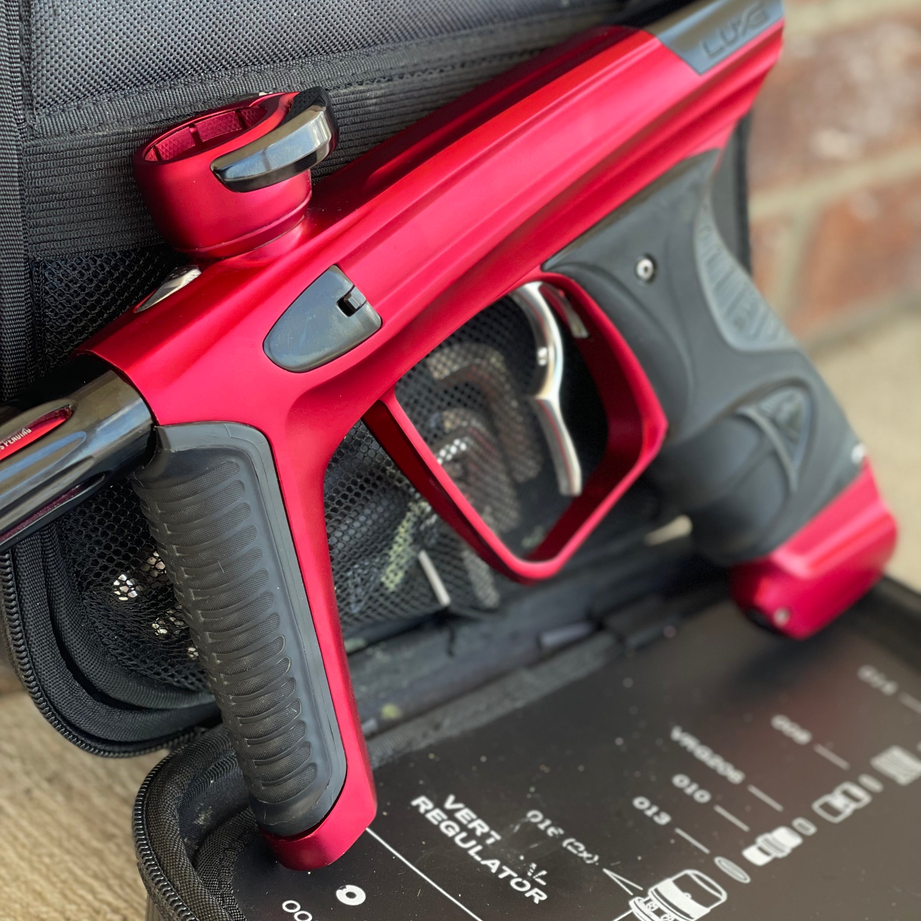 Used DLX Luxe X Paintball Gun - Dust Red w/ Infamous Deuce Trigger