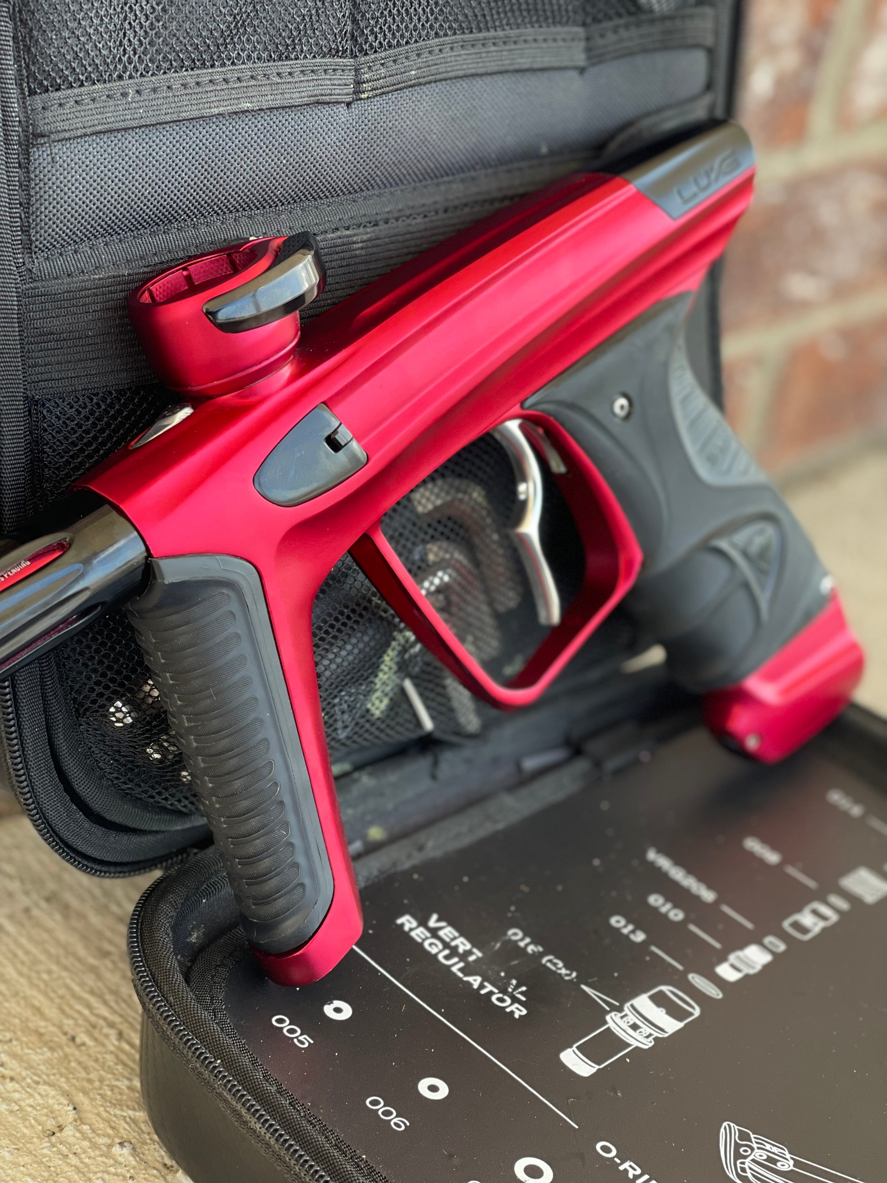 Used DLX Luxe X Paintball Gun - Dust Red w/ Infamous Deuce Trigger
