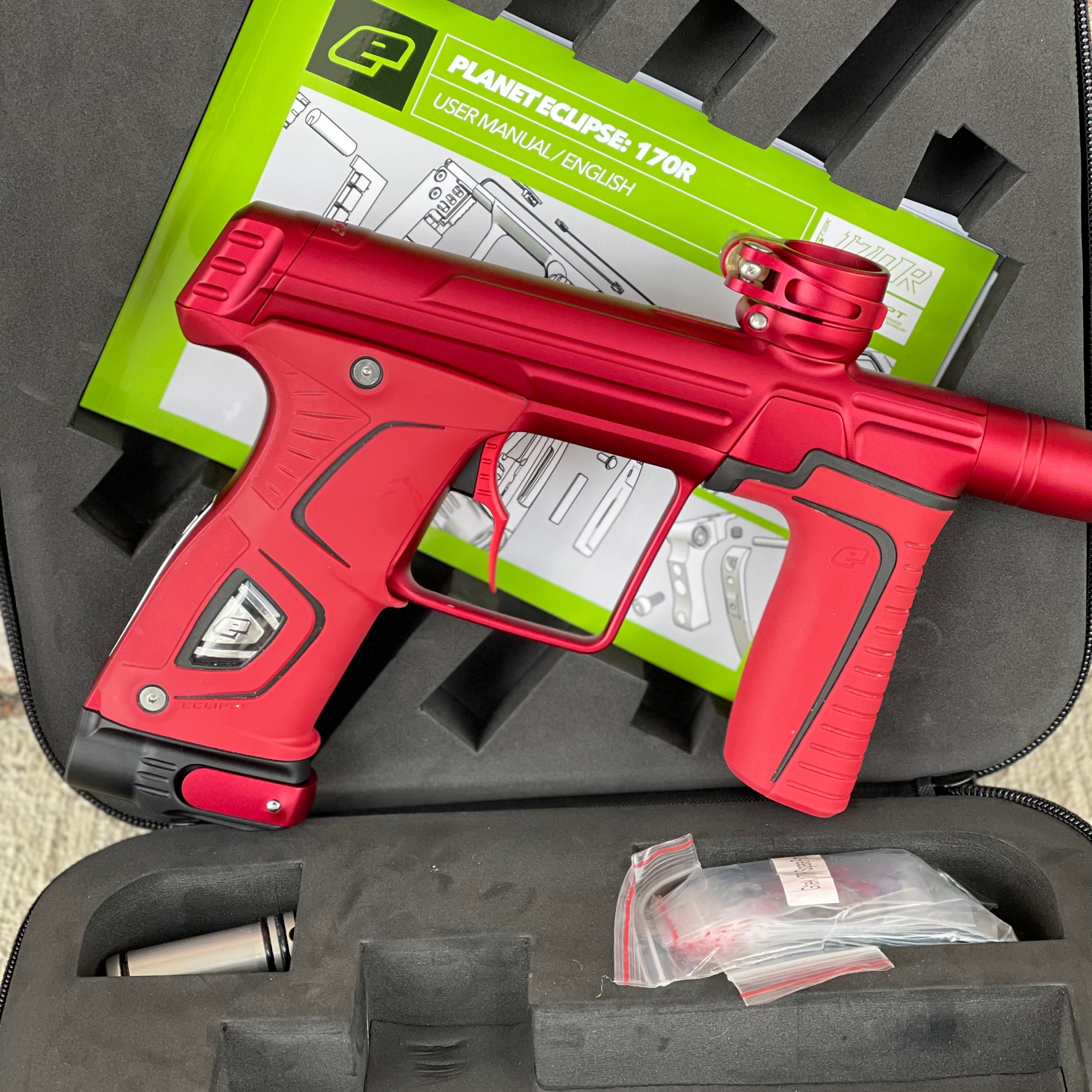Used Planet Eclipse 170R Paintball Gun - Dust Red w/Red Grip Kit, Deuce Trigger, and ST3 Bolt