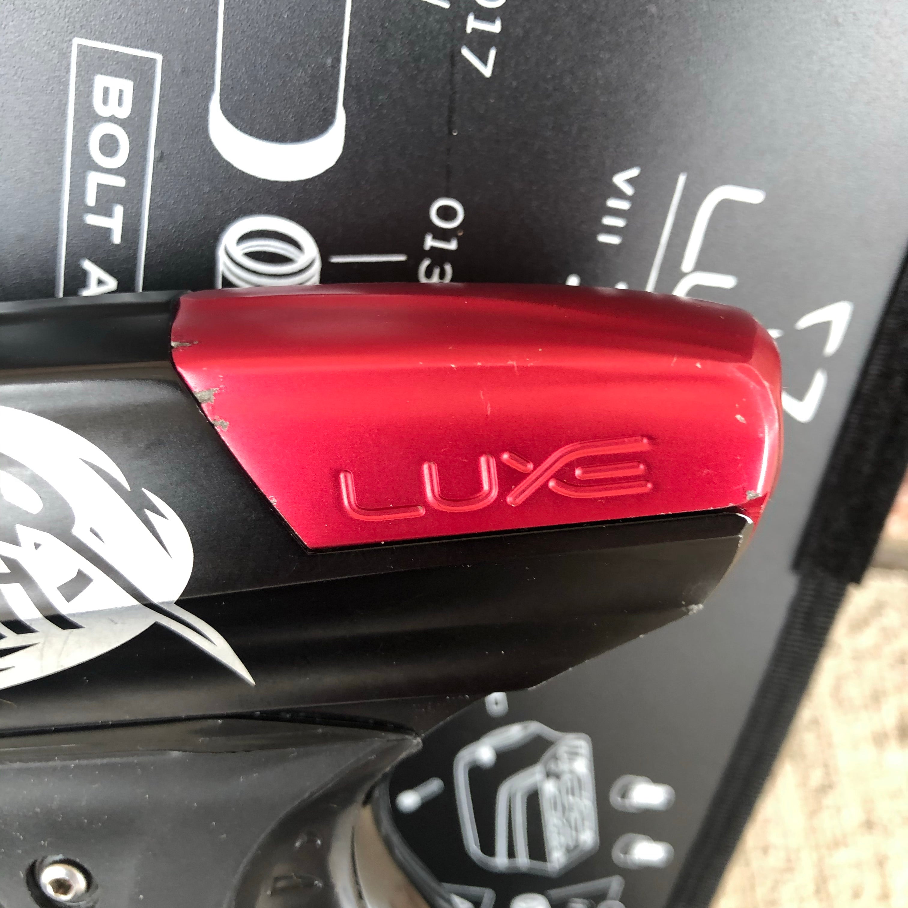 Used DLX Luxe Ice Paintball Gun - Black/Red w/ Aftermath Lazering