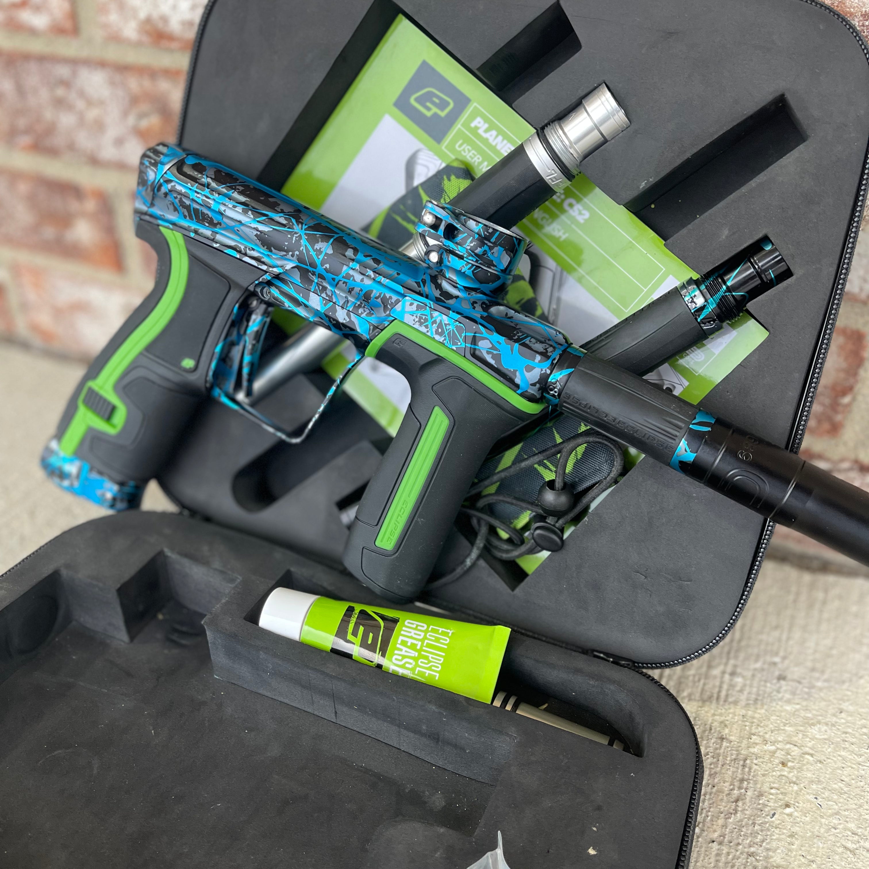Used Planet Eclipse CS2 Paintball Gun - Aftershock Splash w/ Green Grip Kit
