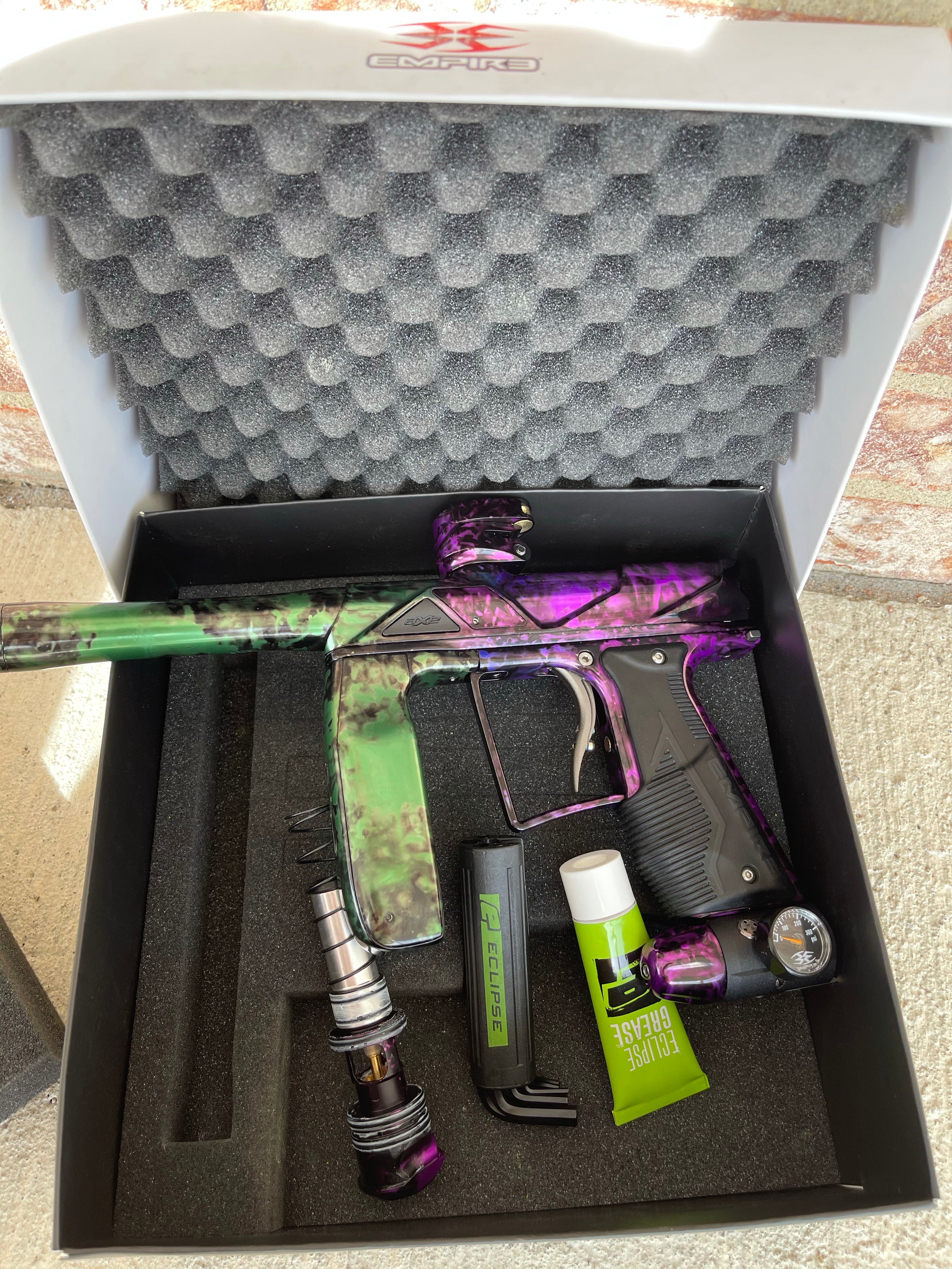 Used Empire Axe Pro Paintball Gun - Acid Wash Pruple / Green