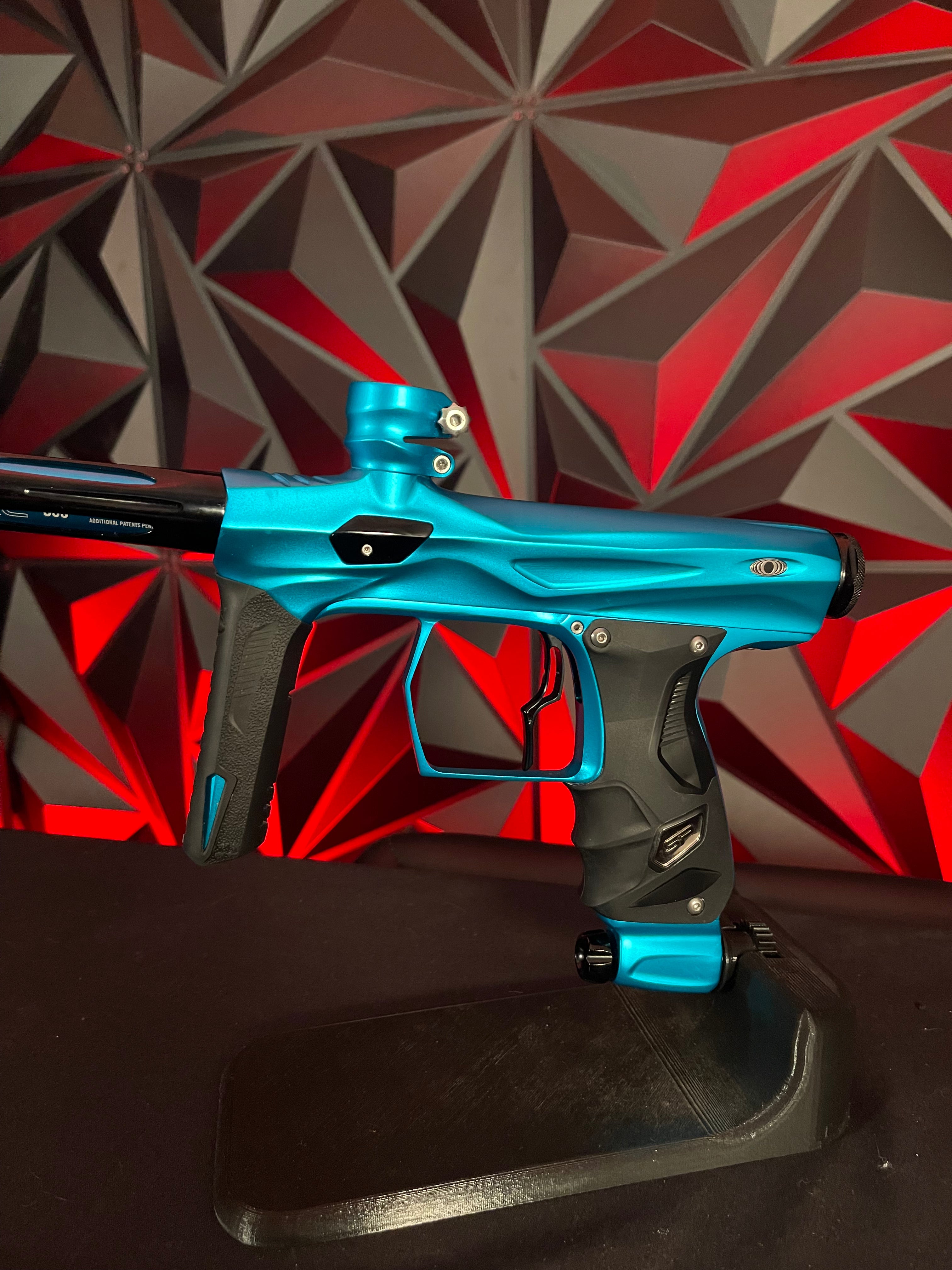 Used Shocker Amp Paintball Gun - Teal w/ Infamous Deuce Trigger