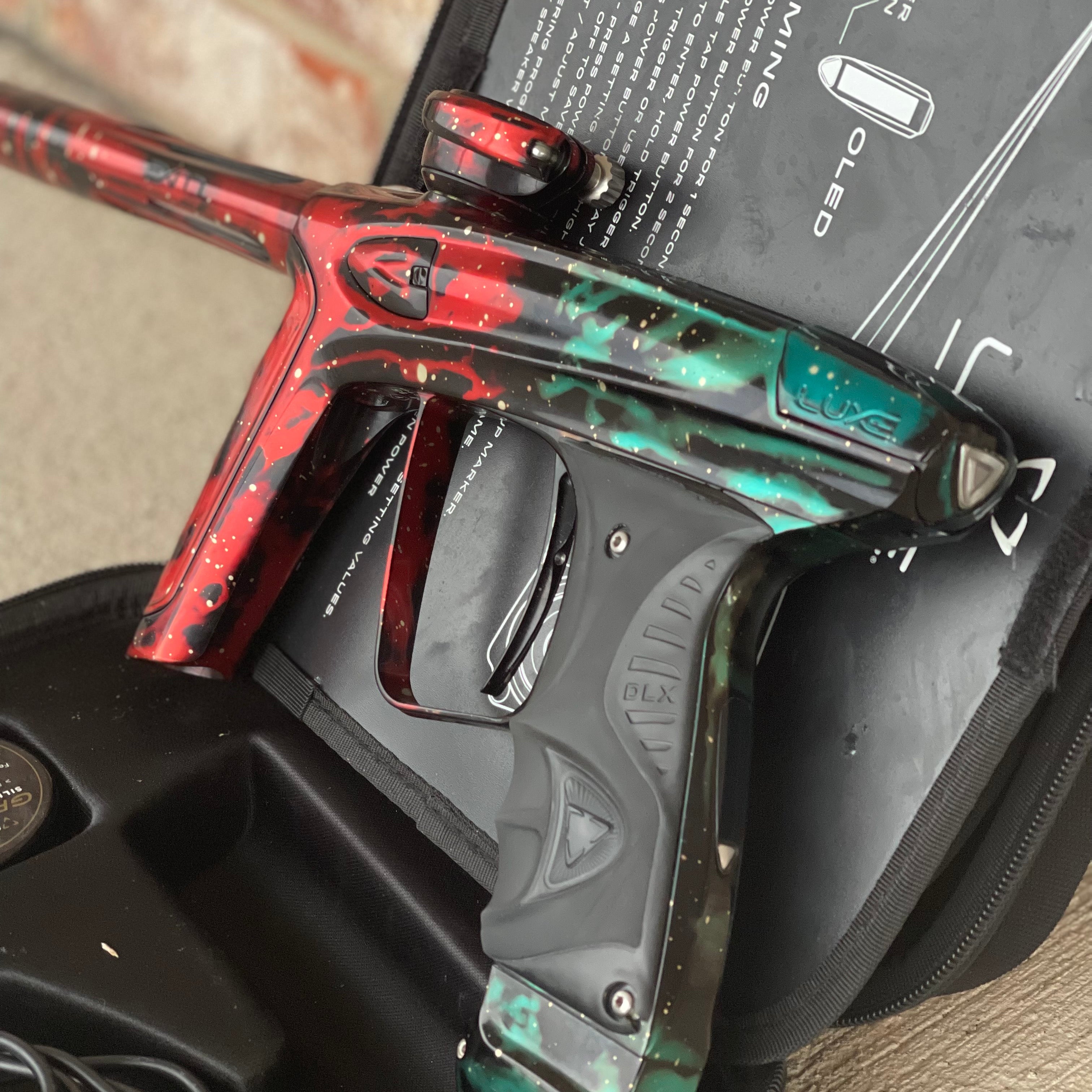 Used DLX Luxe Ice Paintball Gun - Red/Green Galaxy (1 of 15)