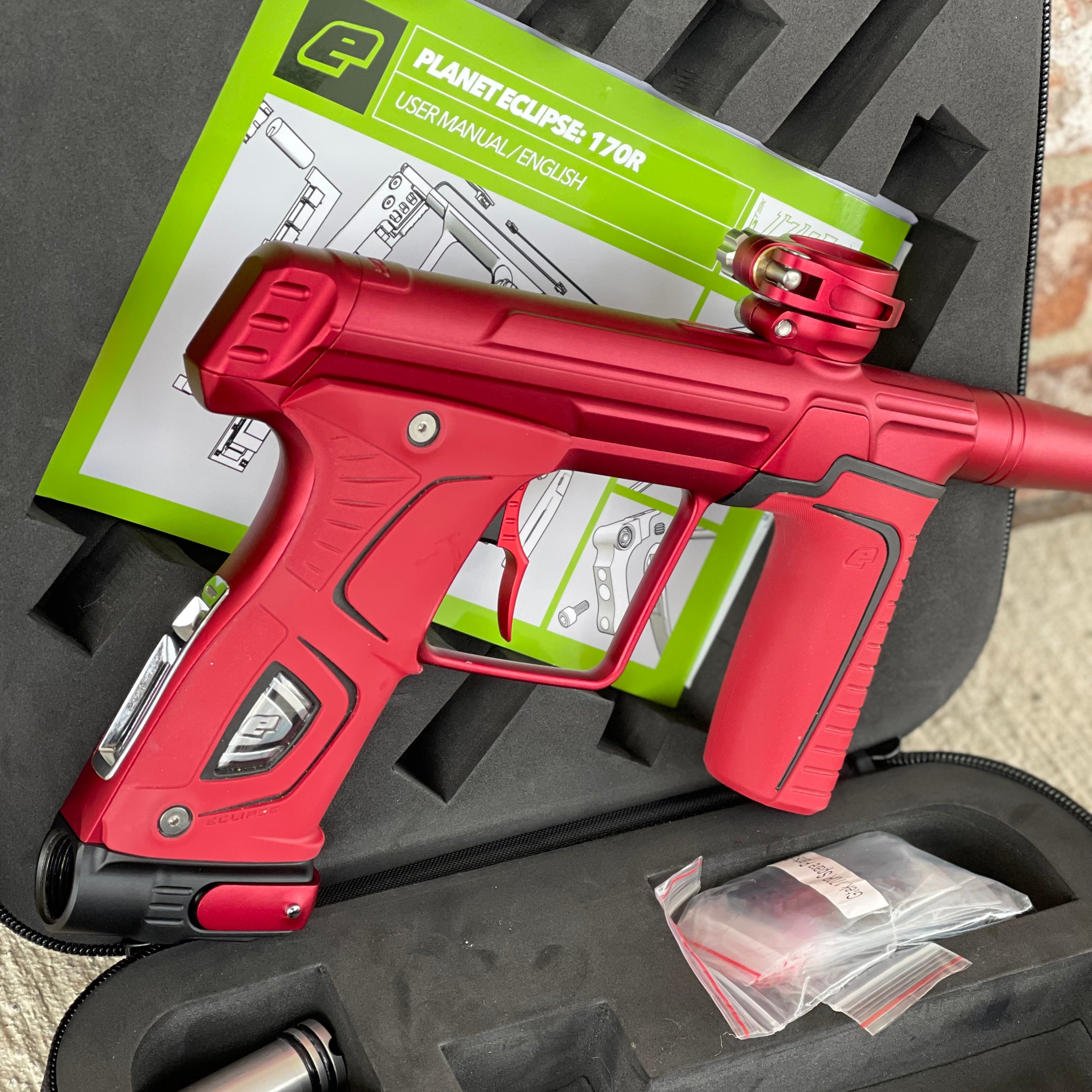 Used Planet Eclipse 170R Paintball Gun - Dust Red w/Red Grip Kit, Deuce Trigger, and ST3 Bolt