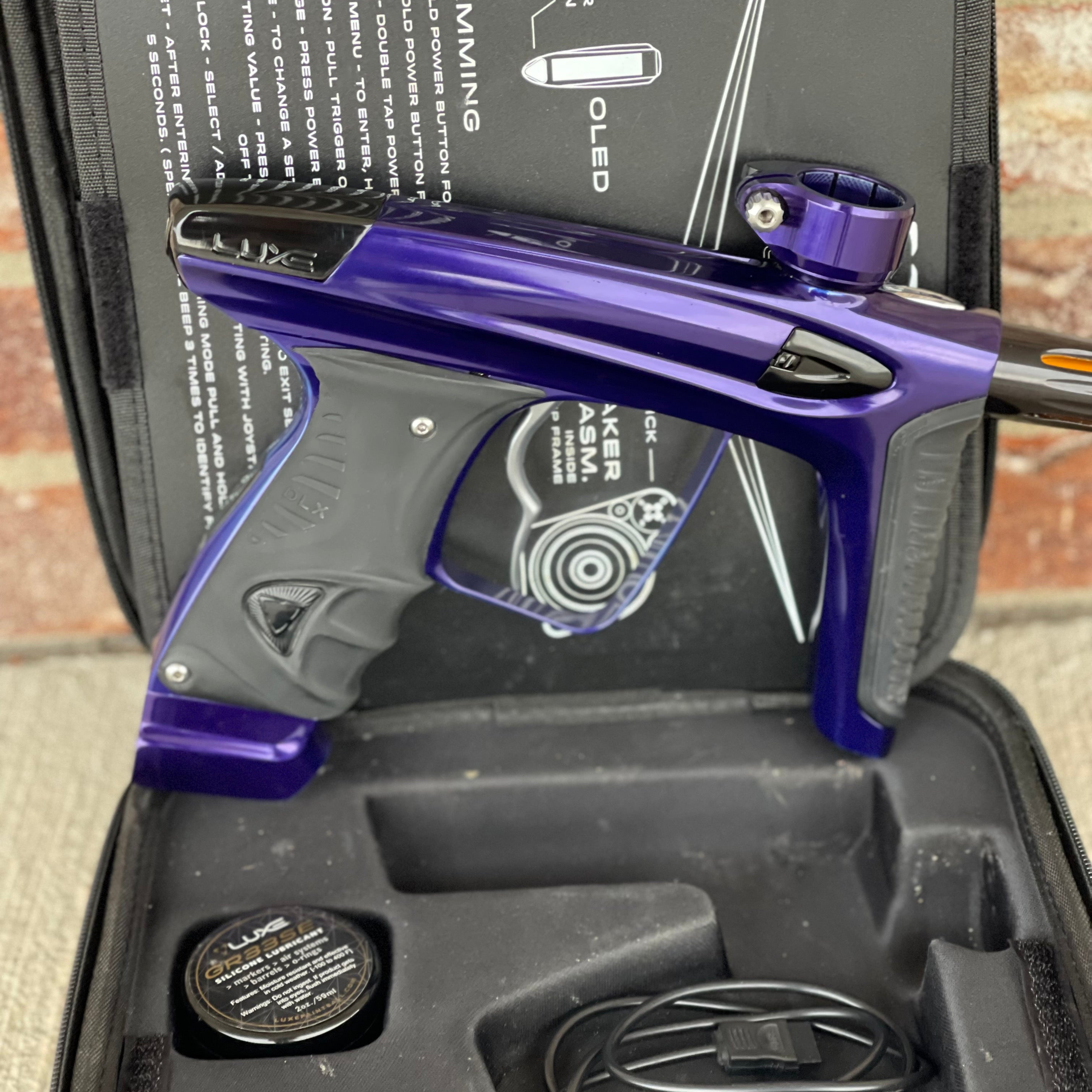 Used DLX Luxe Ice Paintball Gun - Purple / Black