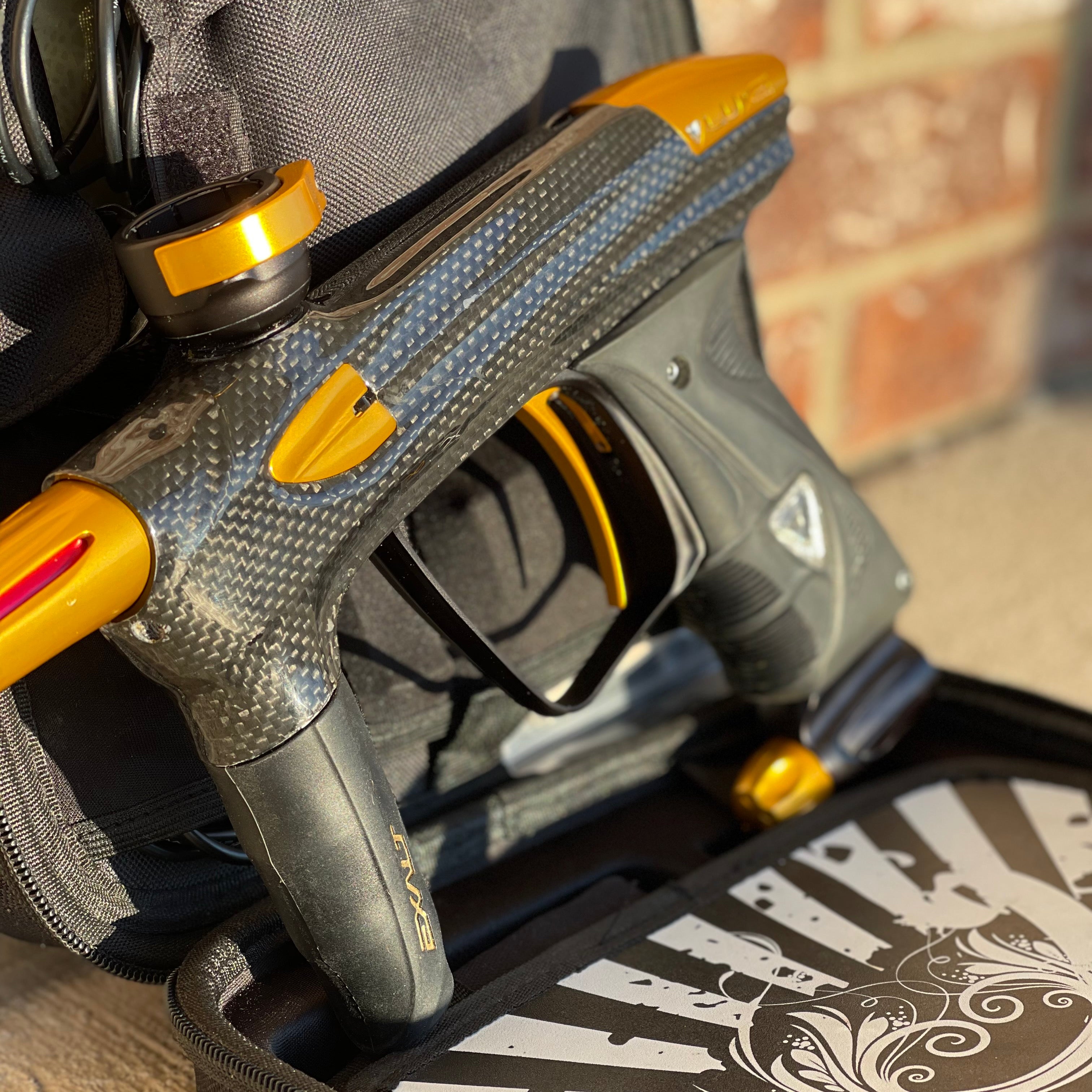 Used DLX Luxe 2.0 Oled Paintball Gun - Carbon / Gold