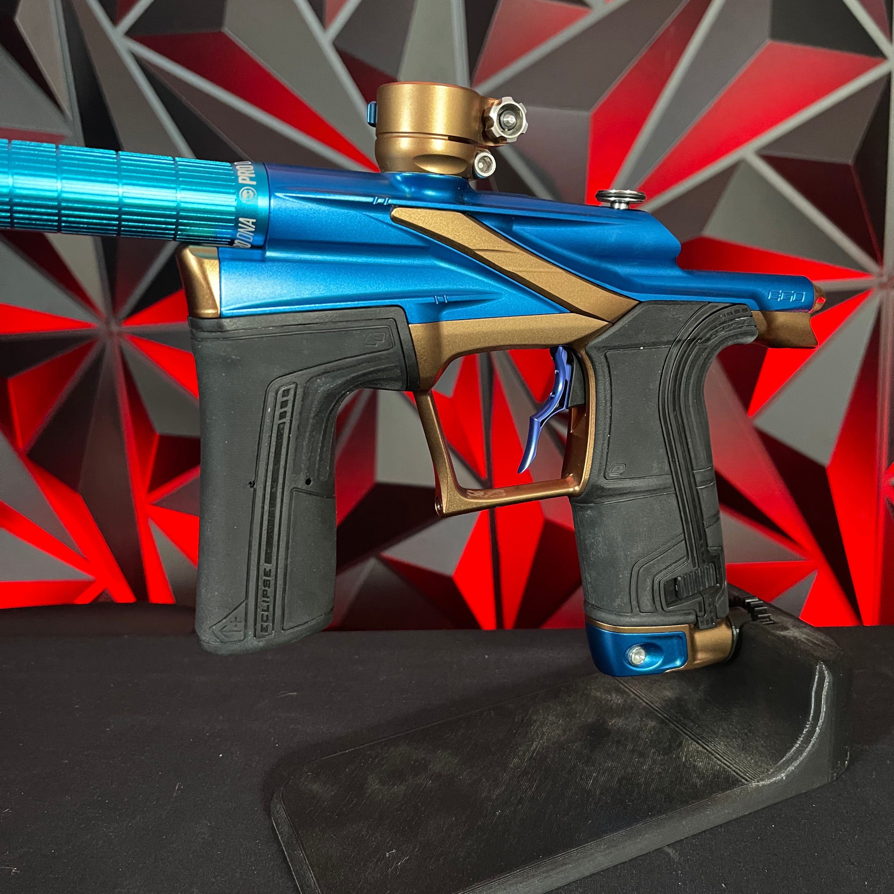 Used Planet Eclipse LV2 Paintball Gun - Blue/Bronze w/ Silencio Power Grip Back *Houston Heat Signed Case*