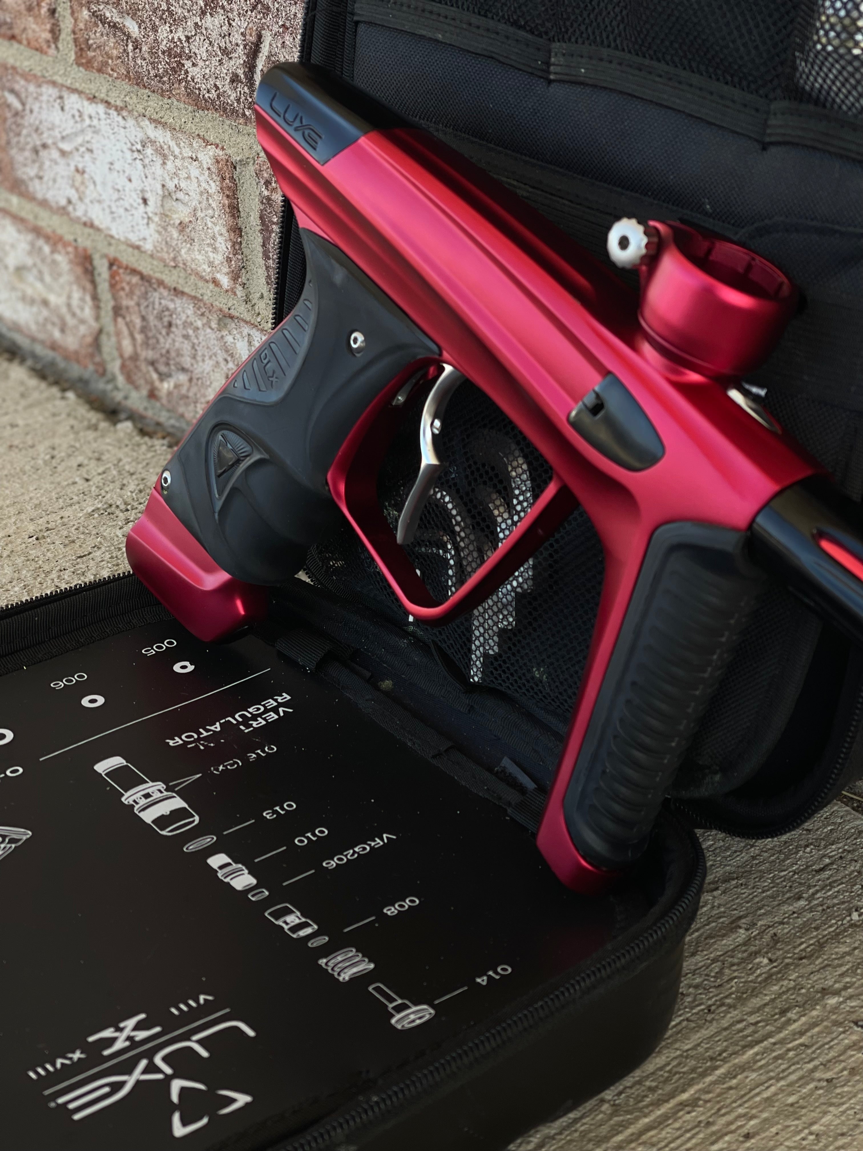 Used DLX Luxe X Paintball Gun - Dust Red w/ Infamous Deuce Trigger