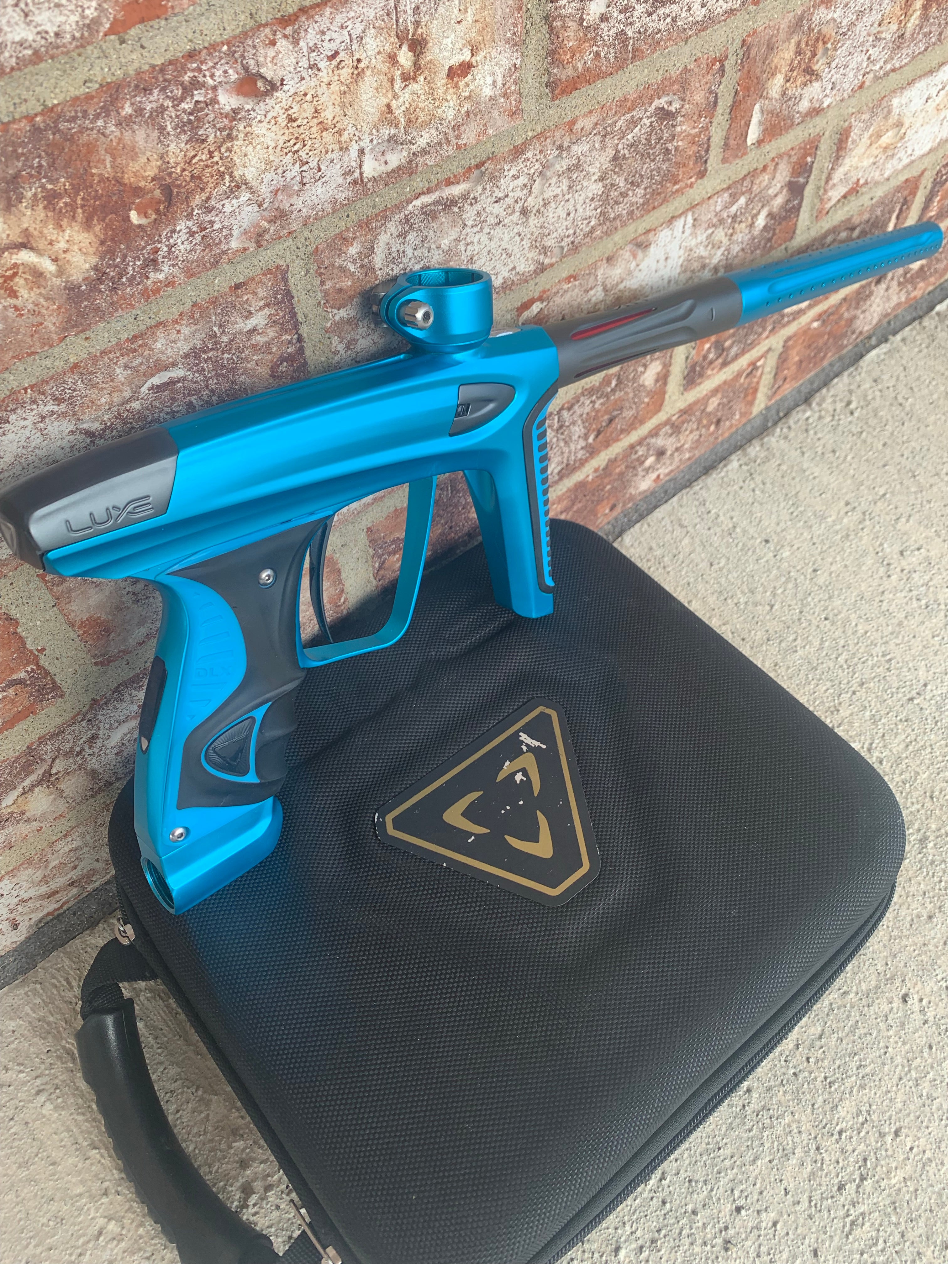Used Smart Parts DLX Ice Paintball Marker- Teal/Gray