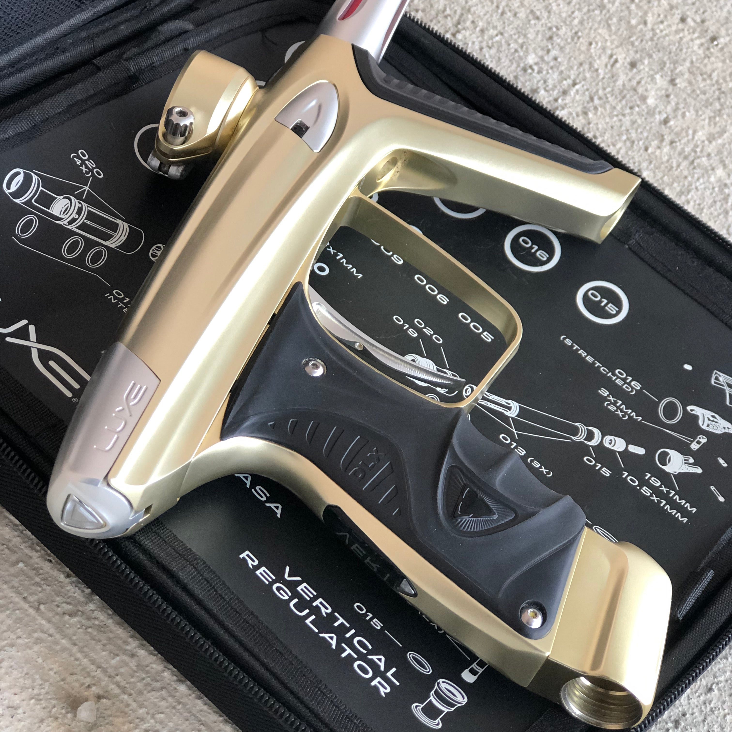 Used DLX Luxe Ice Paintball Gun - Dust Gold/Silver