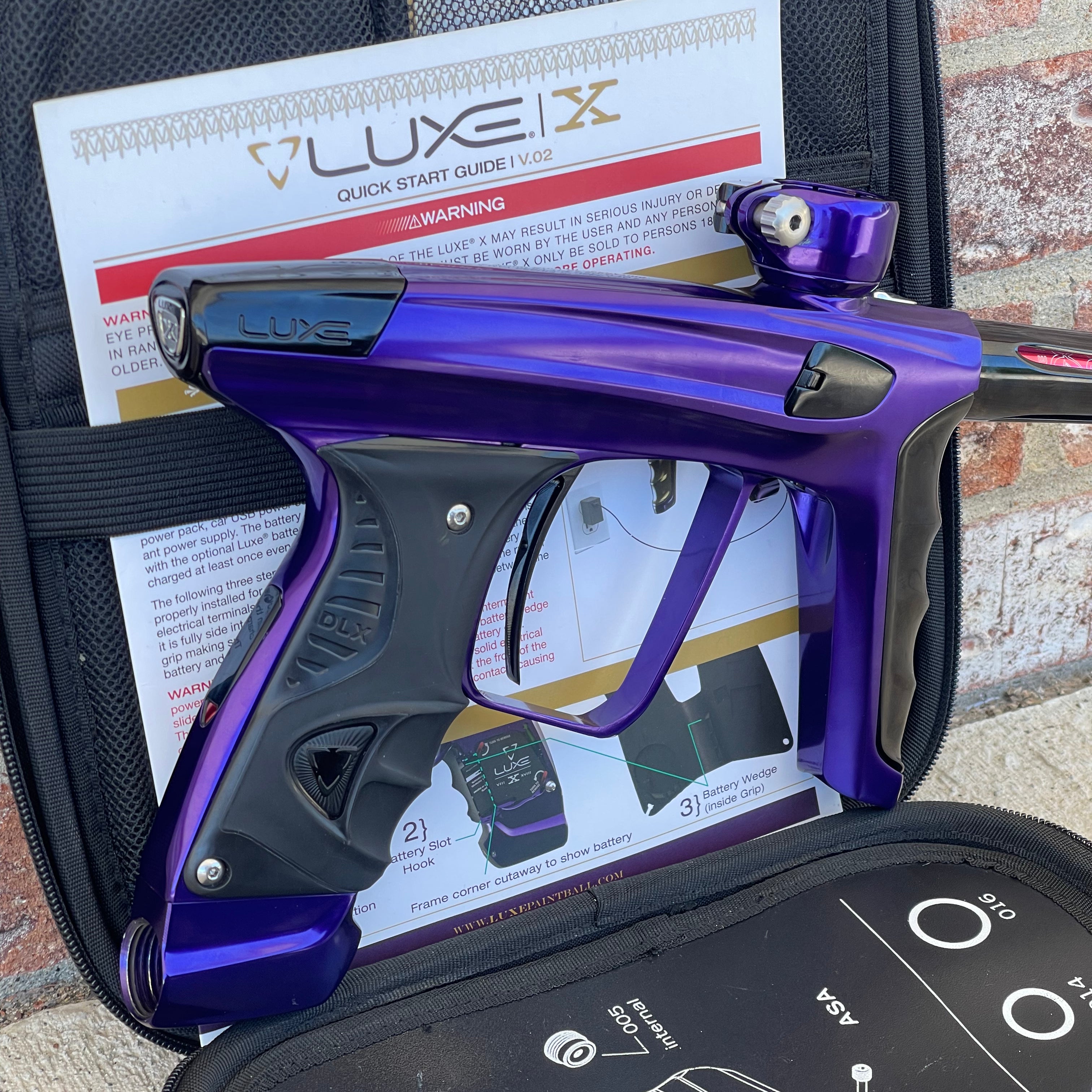 Used DLX Luxe X Paintball Gun - Gloss Purple / Gloss Black