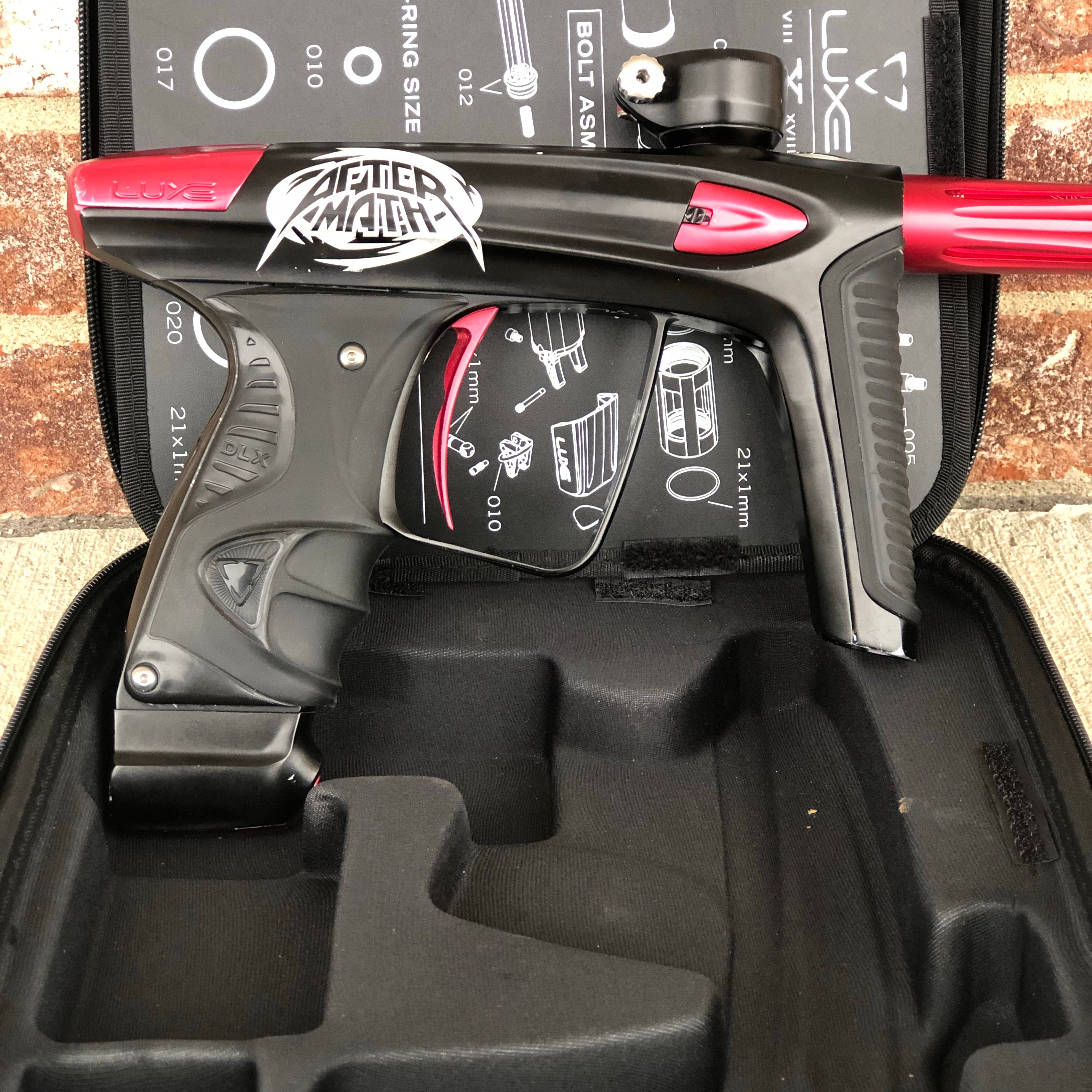 Used DLX Luxe Ice Paintball Gun - Black/Red w/ Aftermath Lazering