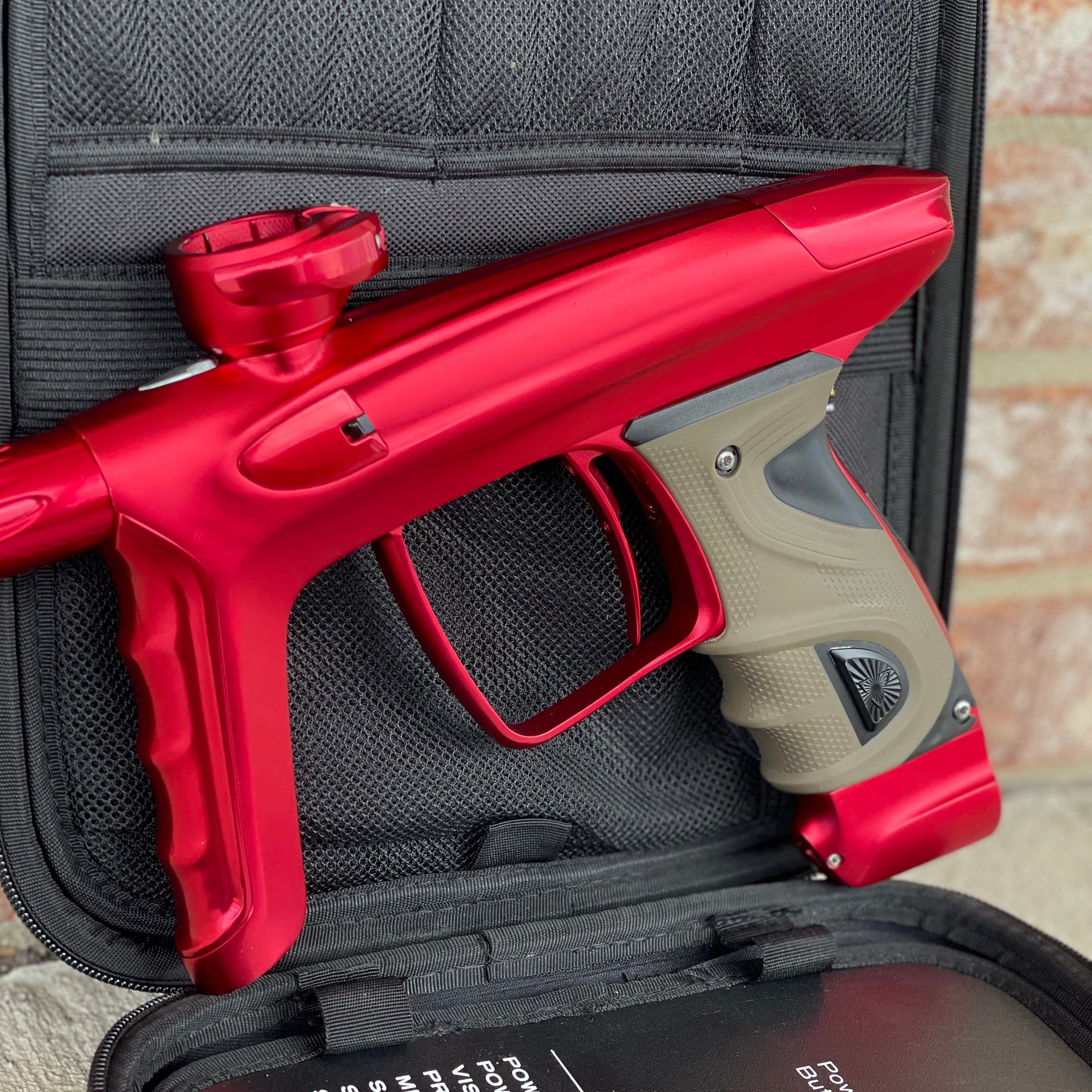 Used DLX Luxe TM40 Paintball Gun - Dust Red / Gloss Red w/ 2 back grips and SSC Soft Tip Bolt