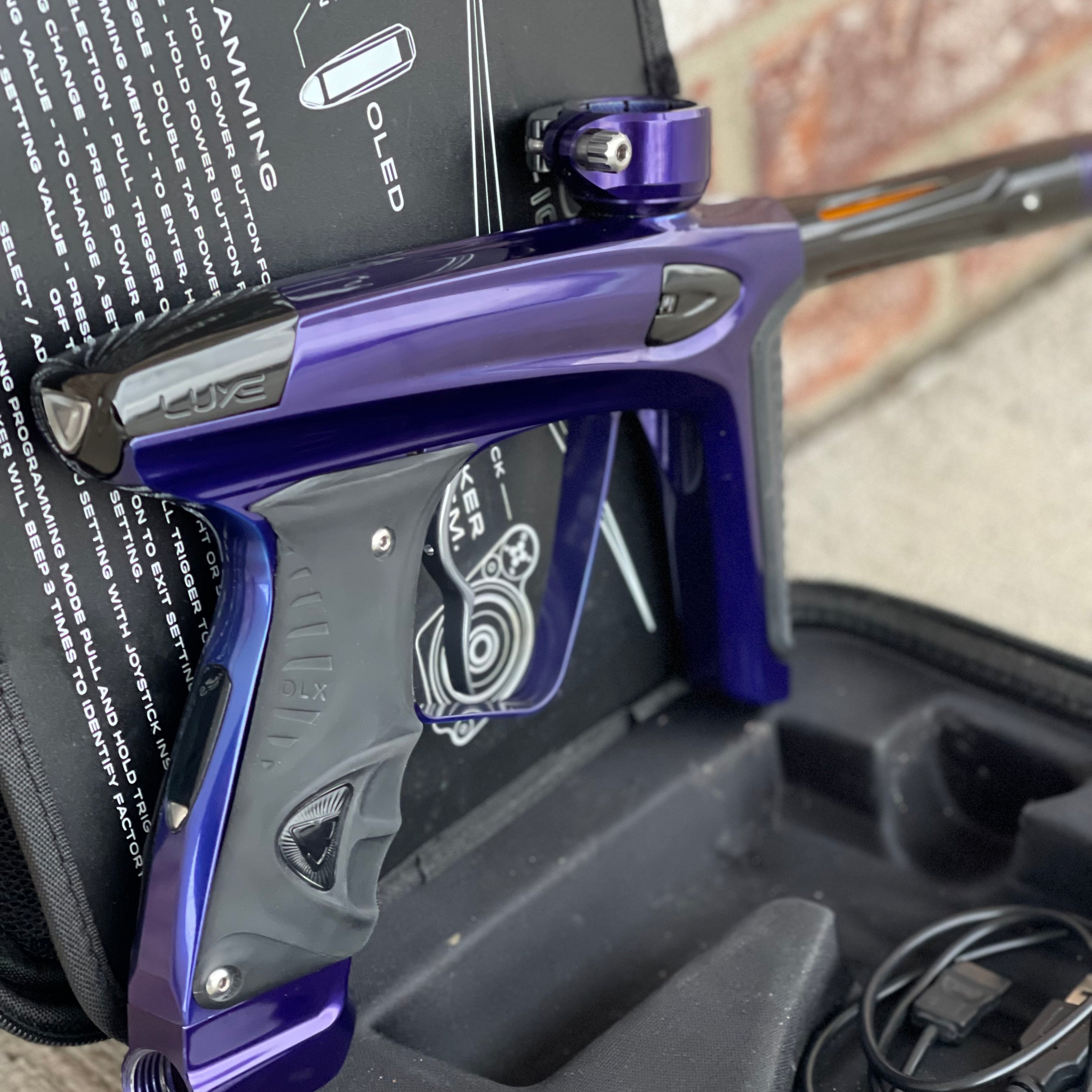 Used DLX Luxe Ice Paintball Gun - Purple / Black