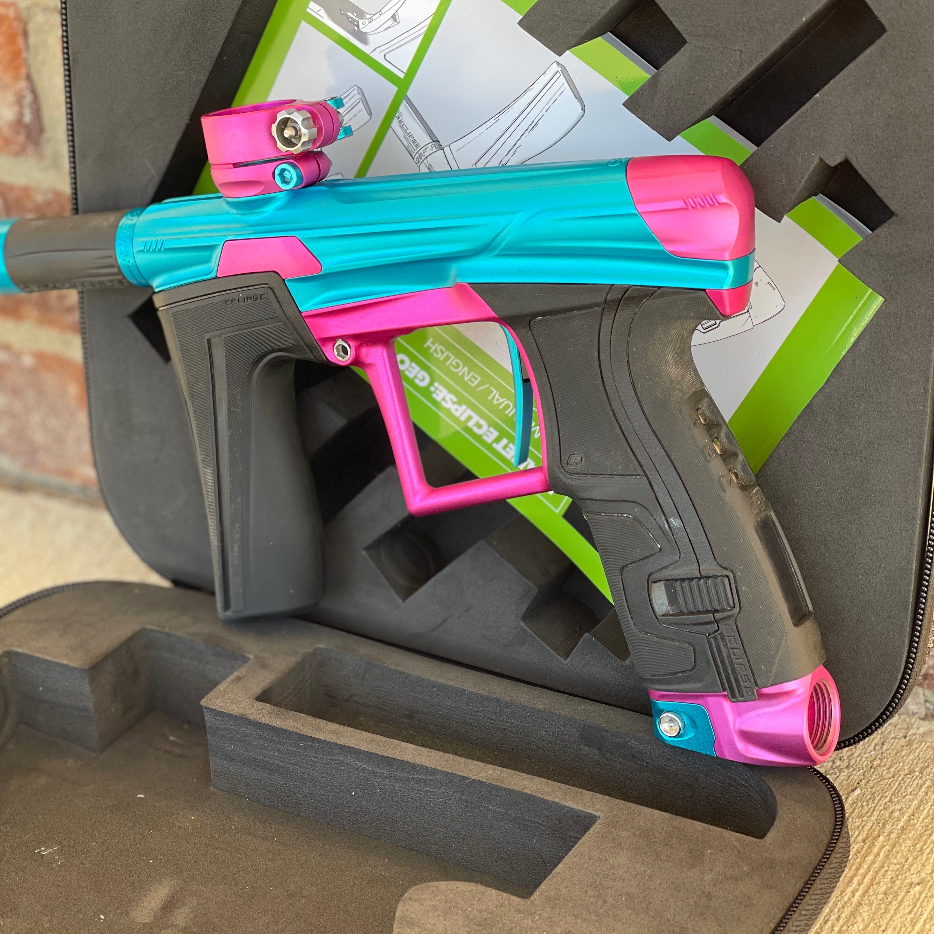 Used Planet Eclipse Geo 4 Paintball Gun - Teal/Pink