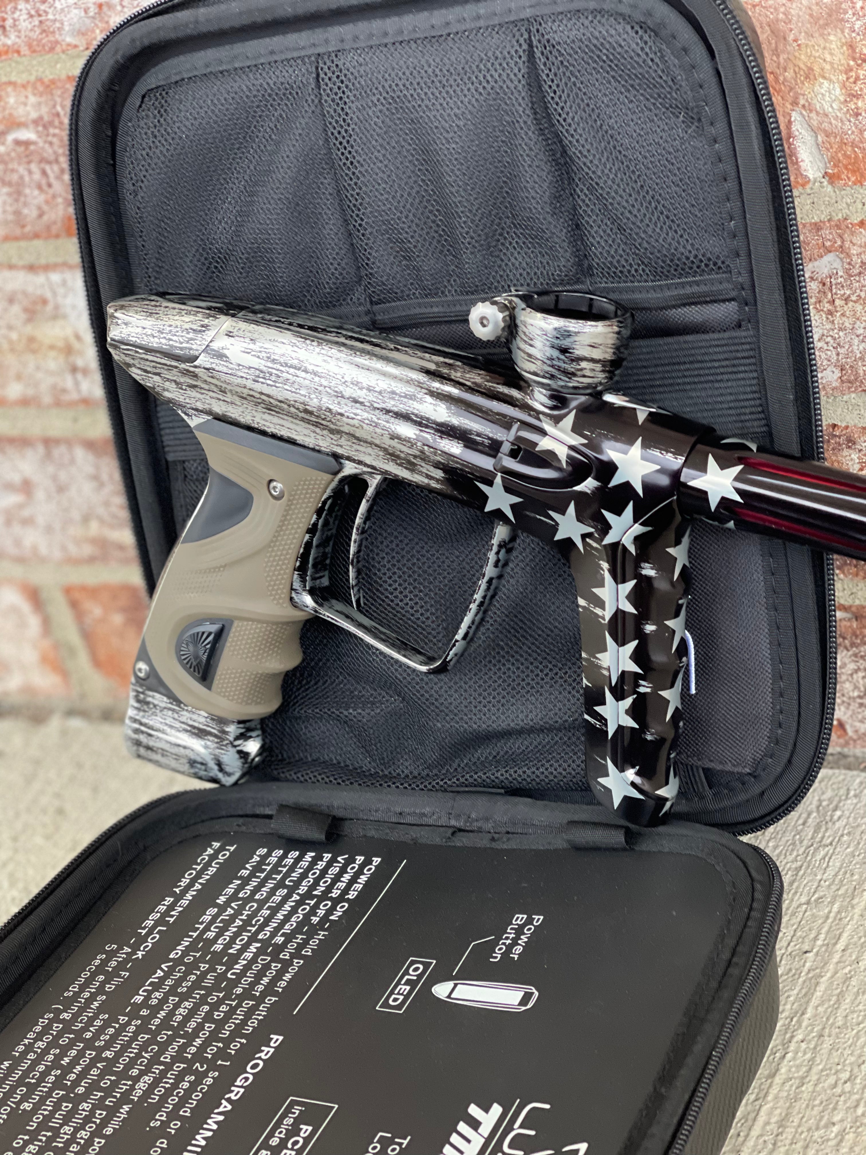 Used DLX Luxe TM40 Paintball Gun - Black Flag