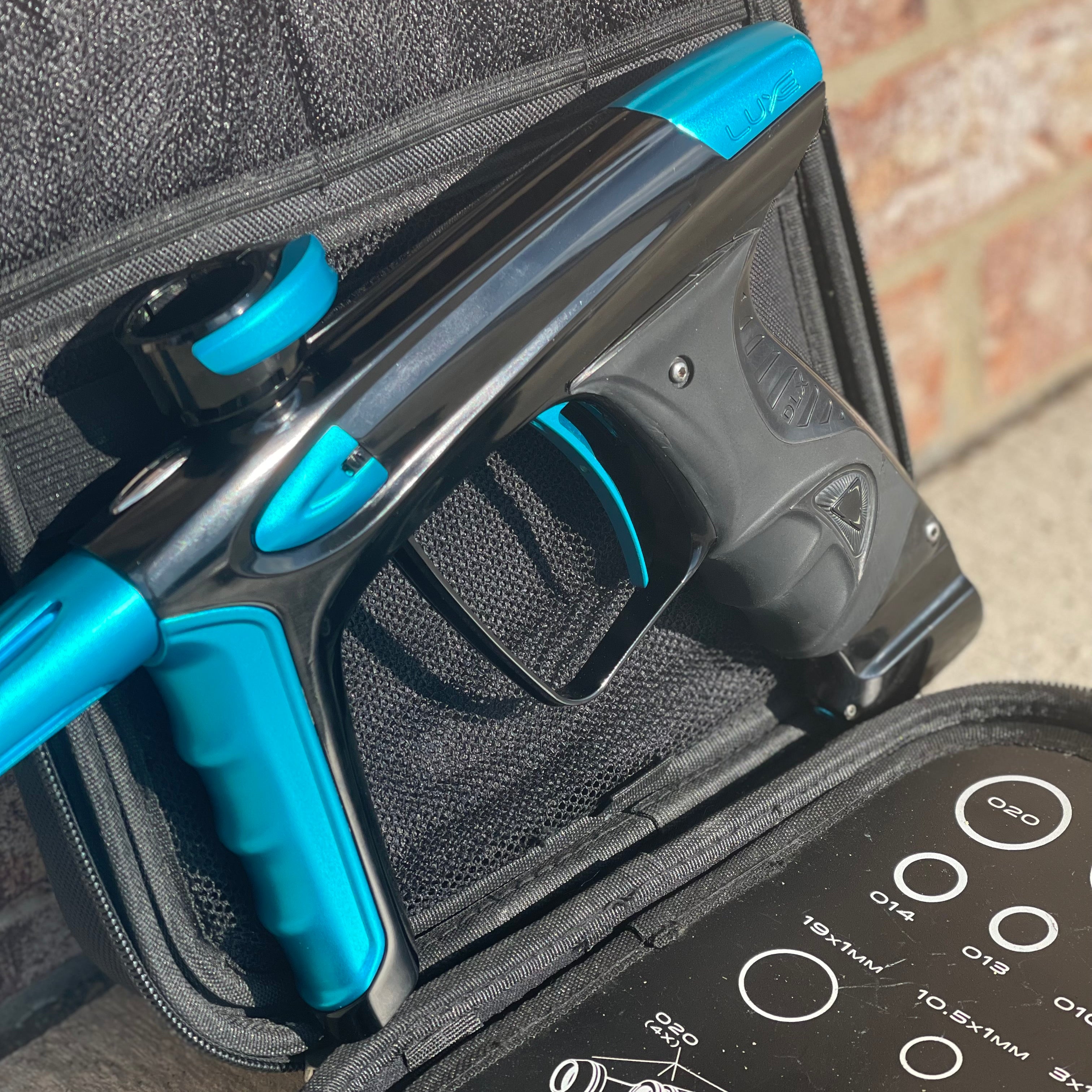 Used DLX Luxe Ice Paintball Gun - Polished Black / Dust Teal