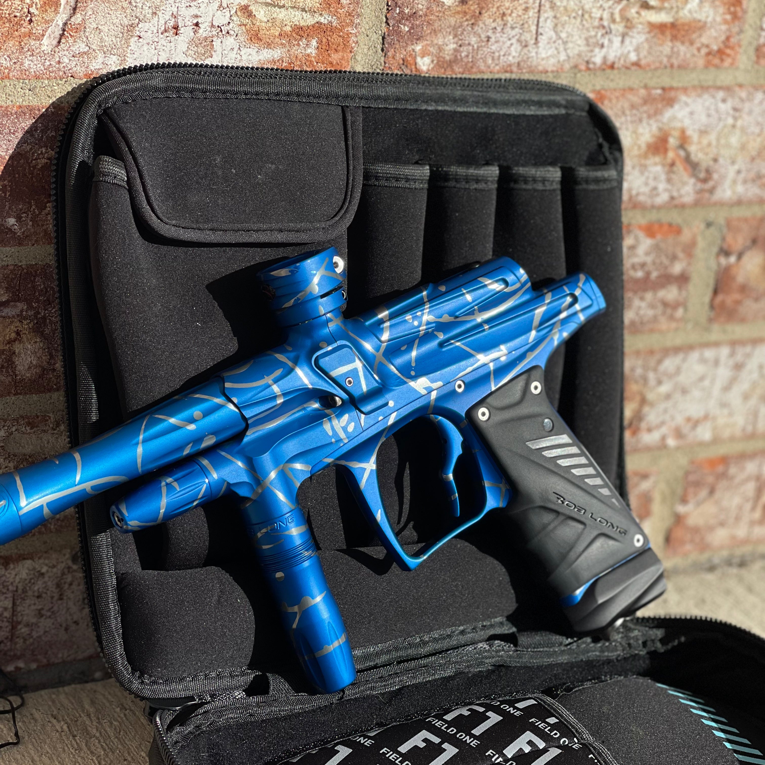 Used Bob Long G6R OLED Paintball Gun - Z Cut - Blue/Silver Splash