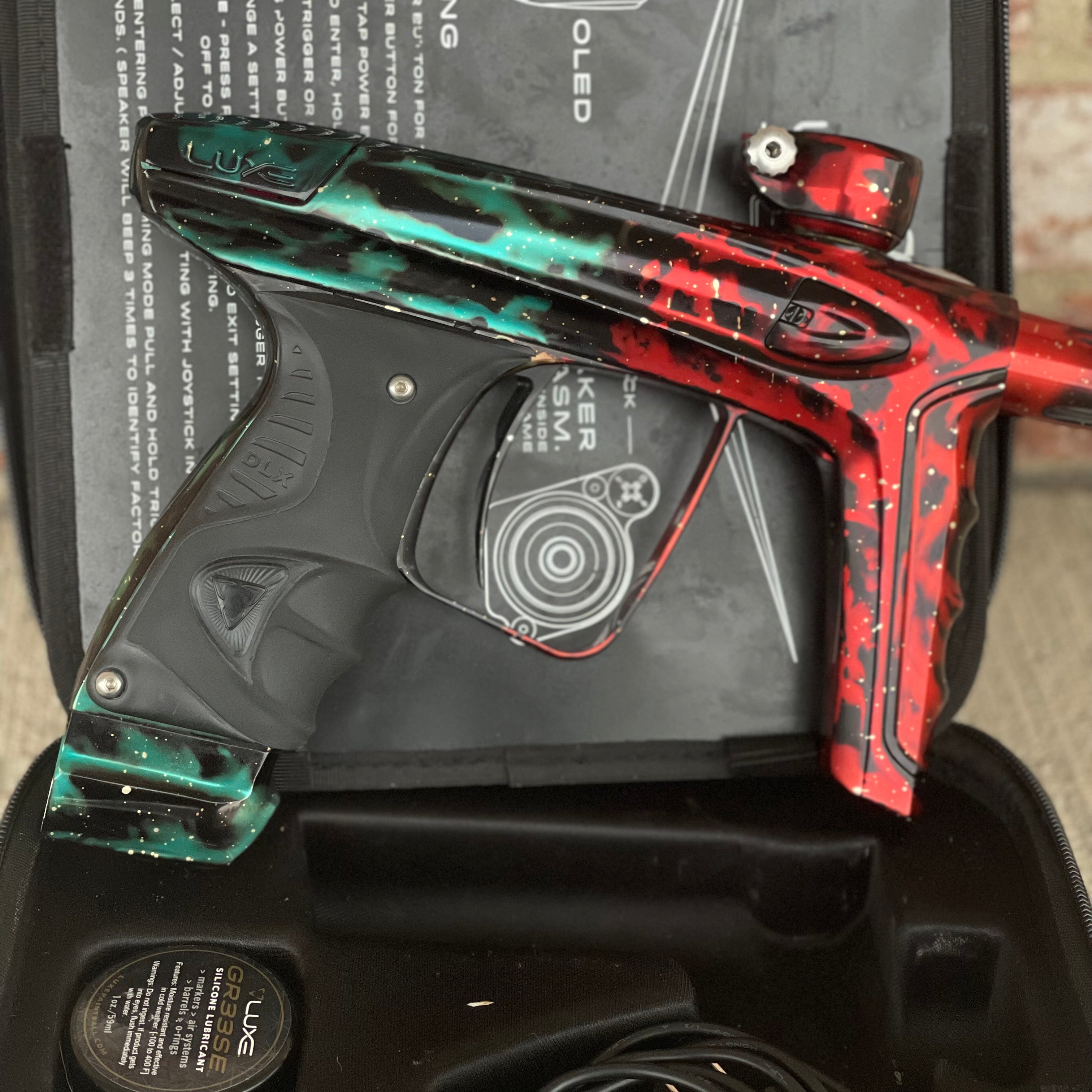 Used DLX Luxe Ice Paintball Gun - Red/Green Galaxy (1 of 15)