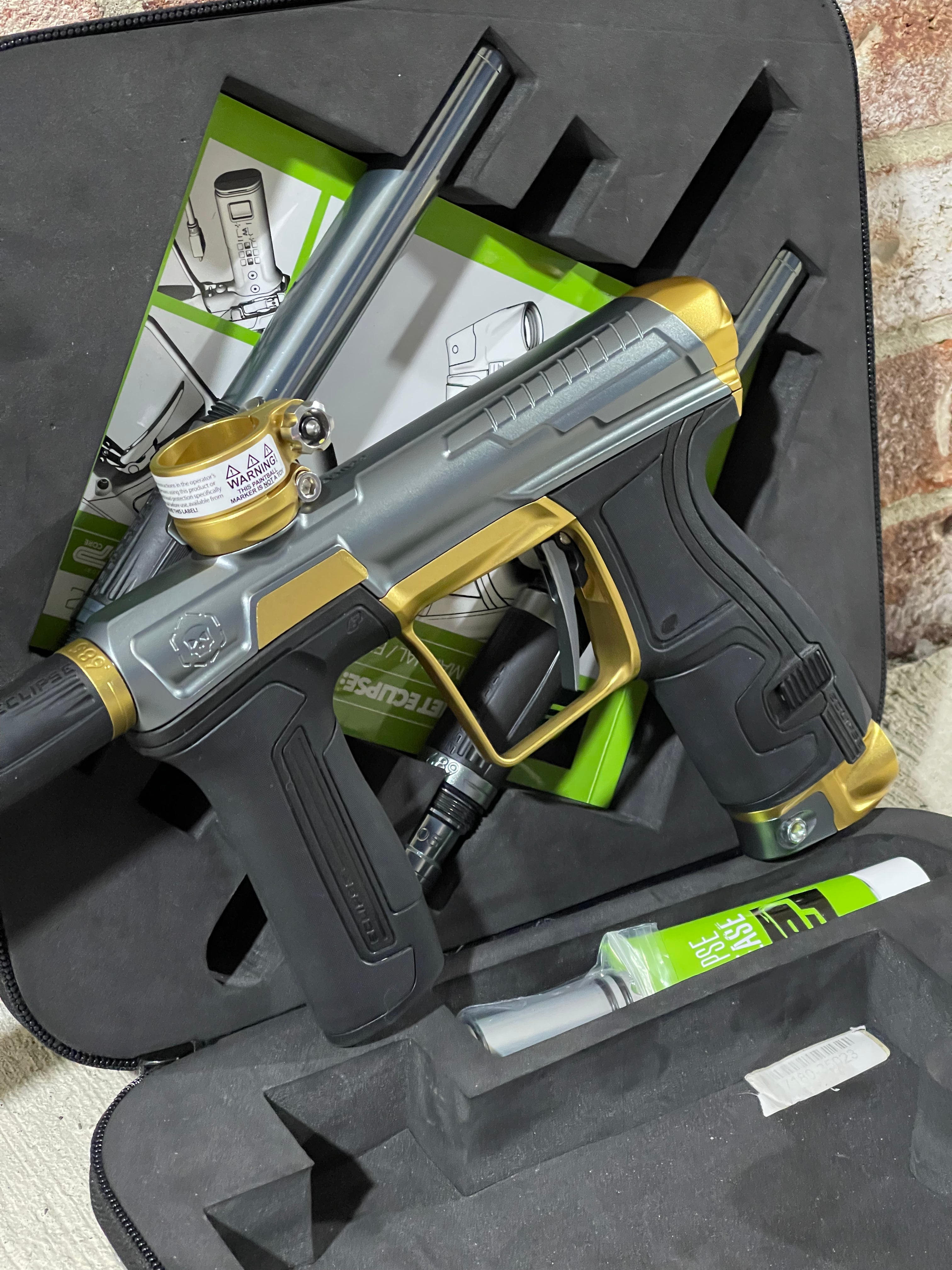 Used Infamous / Planet Eclipse CS2 Paintball Gun - Grey / Gold w/ 3 FL Inserts