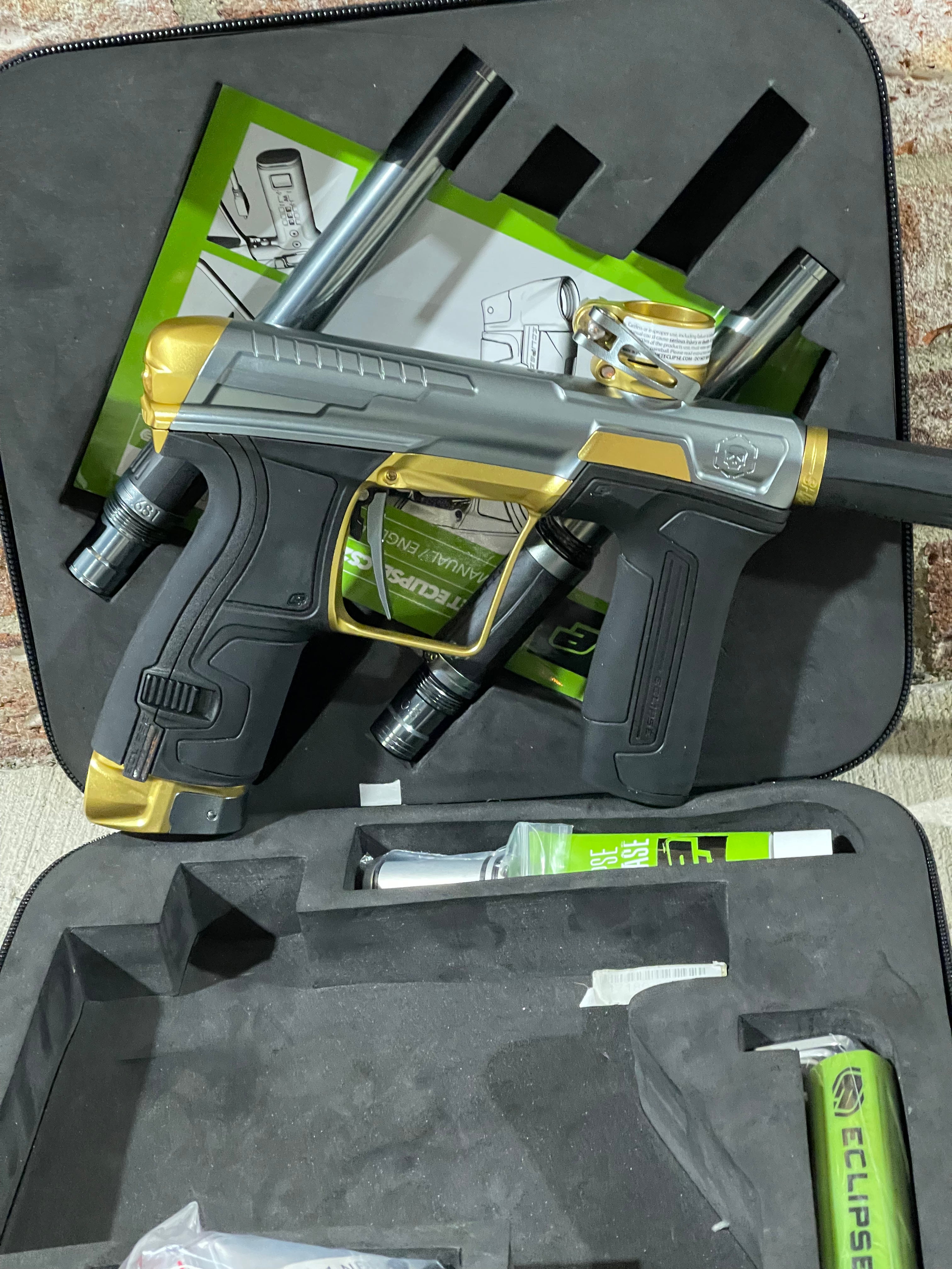 Used Infamous / Planet Eclipse CS2 Paintball Gun - Grey / Gold w/ 3 FL Inserts