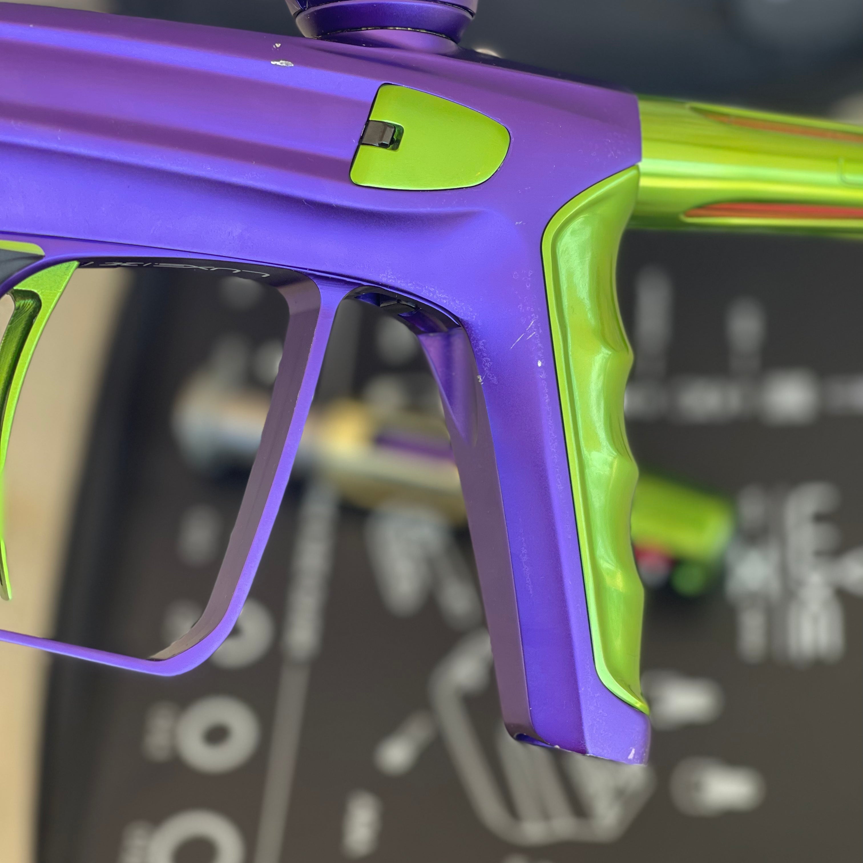 Used DLX Luxe X Paintball Gun - Dust Purple / Polished Green