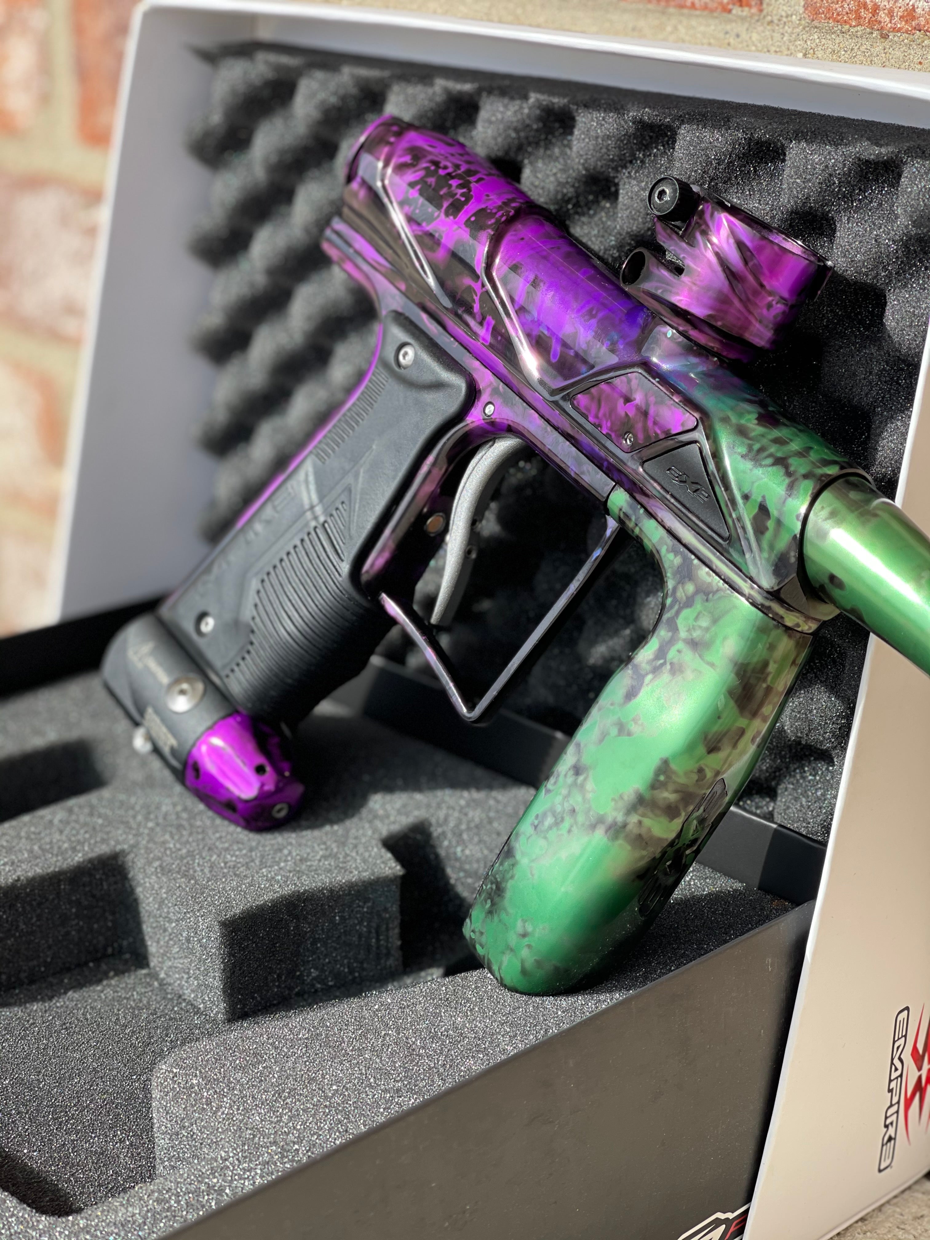 Used Empire Axe Pro Paintball Gun - Acid Wash Pruple / Green