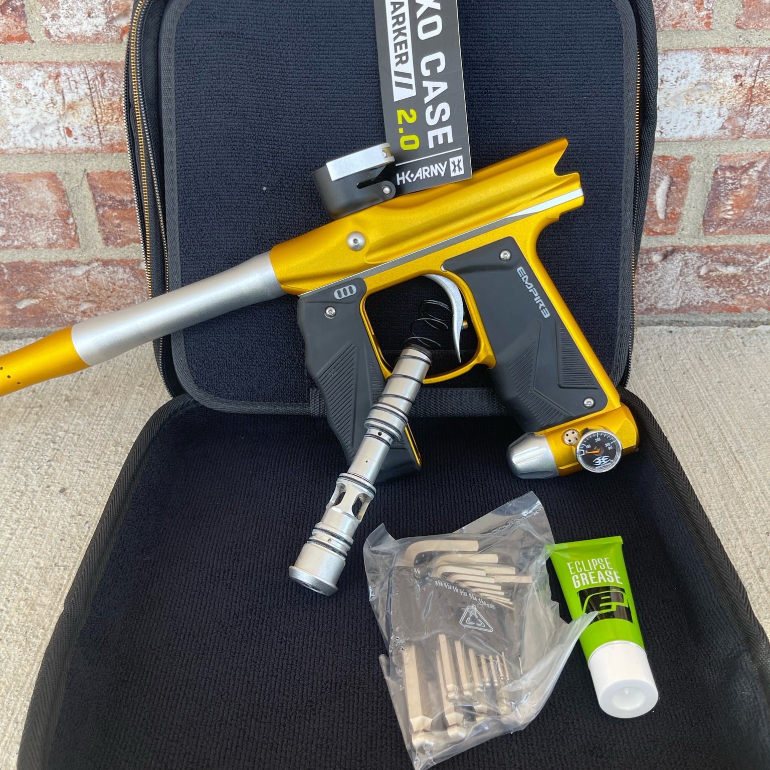 Used Empire Mini GS Paintball Gun w/ 2 Piece Barrel - Dust Gold / Silver w/ HK Army Exo 2.0 Marker Case