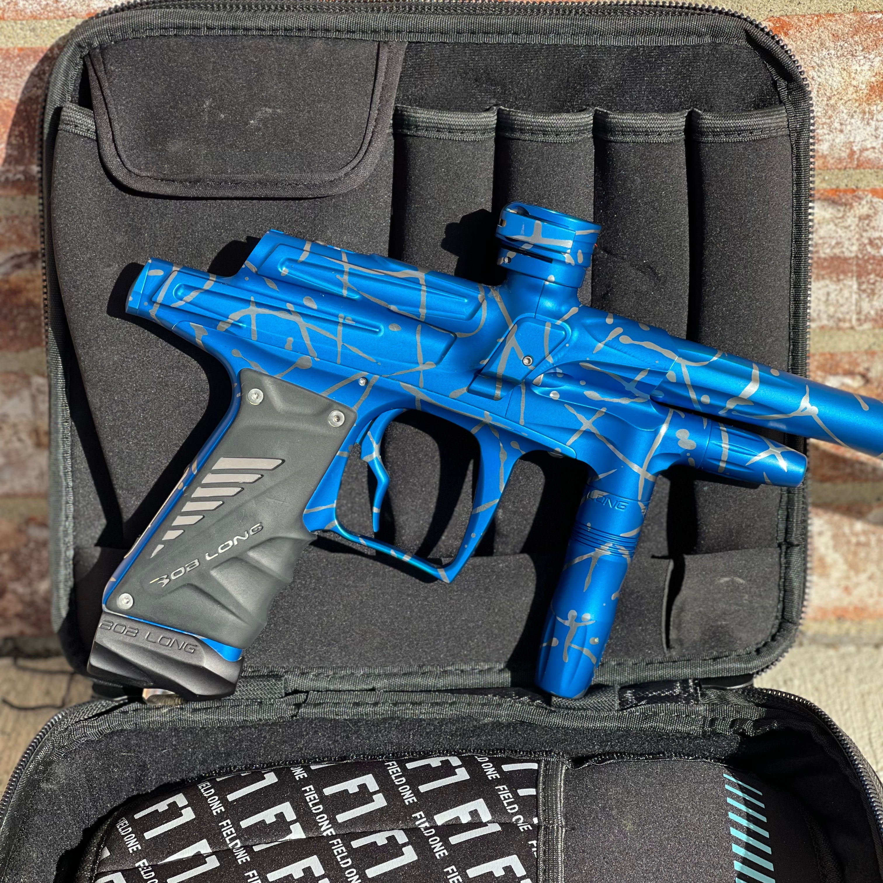Used Bob Long G6R OLED Paintball Gun - Z Cut - Blue/Silver Splash
