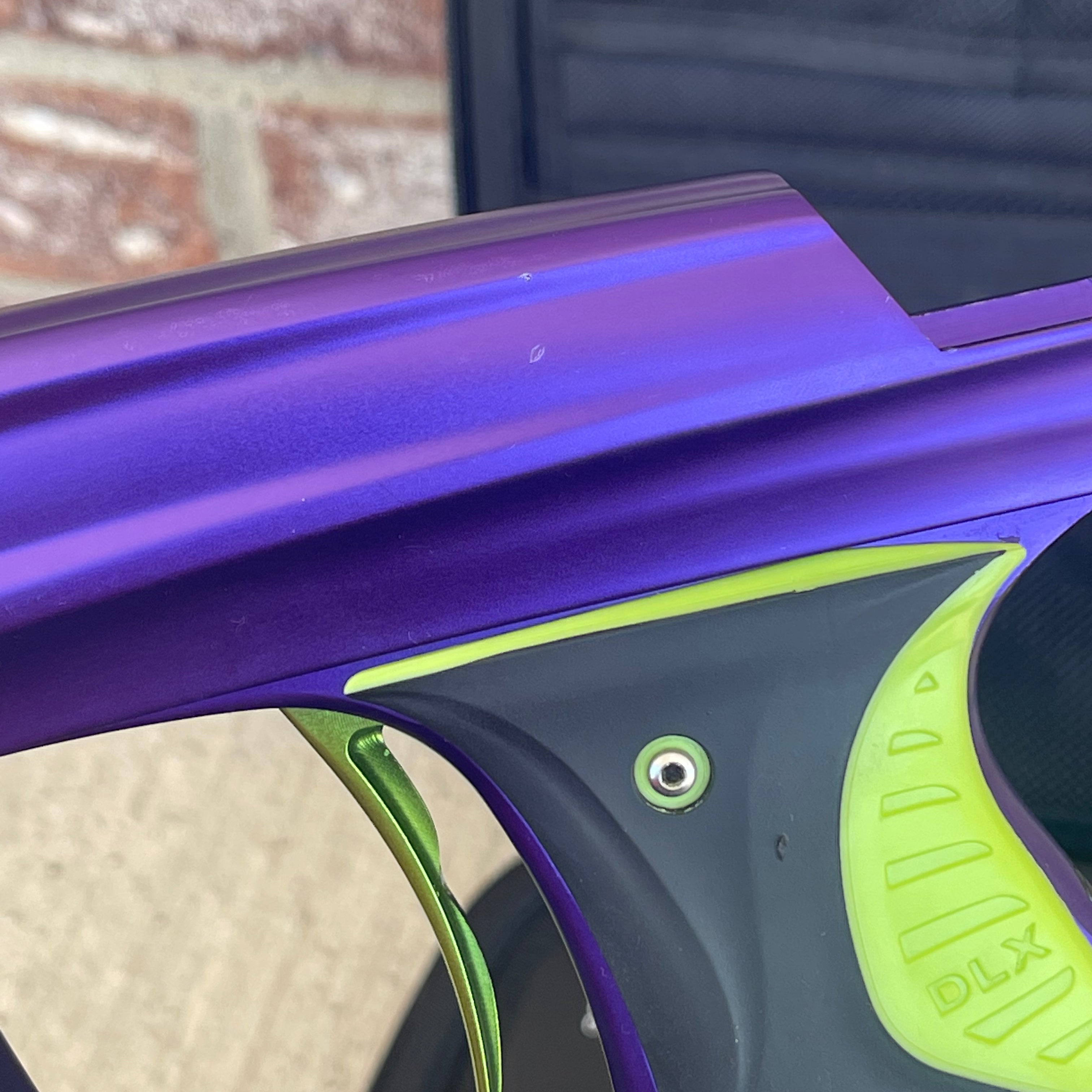 Used DLX Luxe X Paintball Gun - Dust Purple / Polished Green