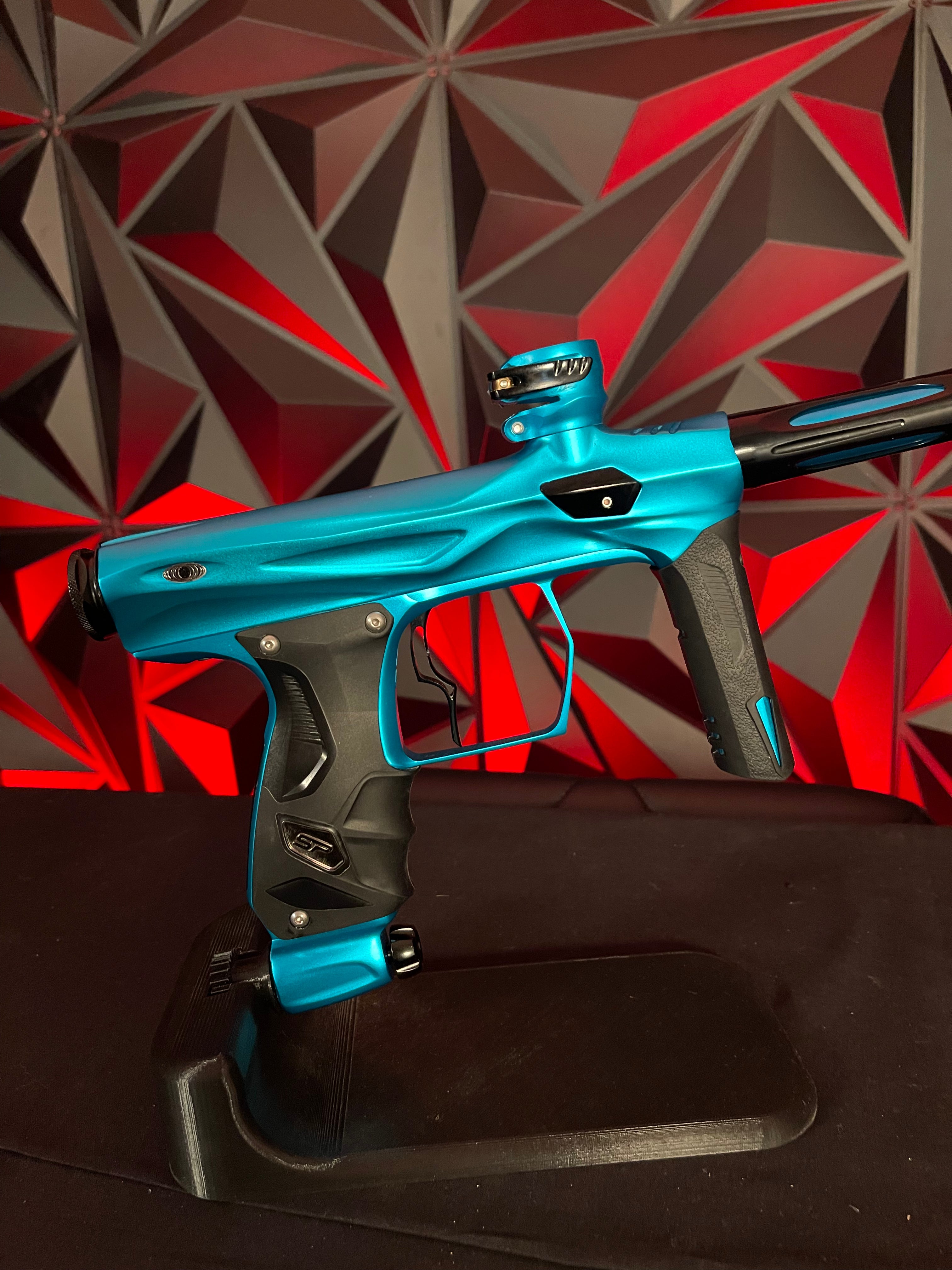 Used Shocker Amp Paintball Gun - Teal w/ Infamous Deuce Trigger