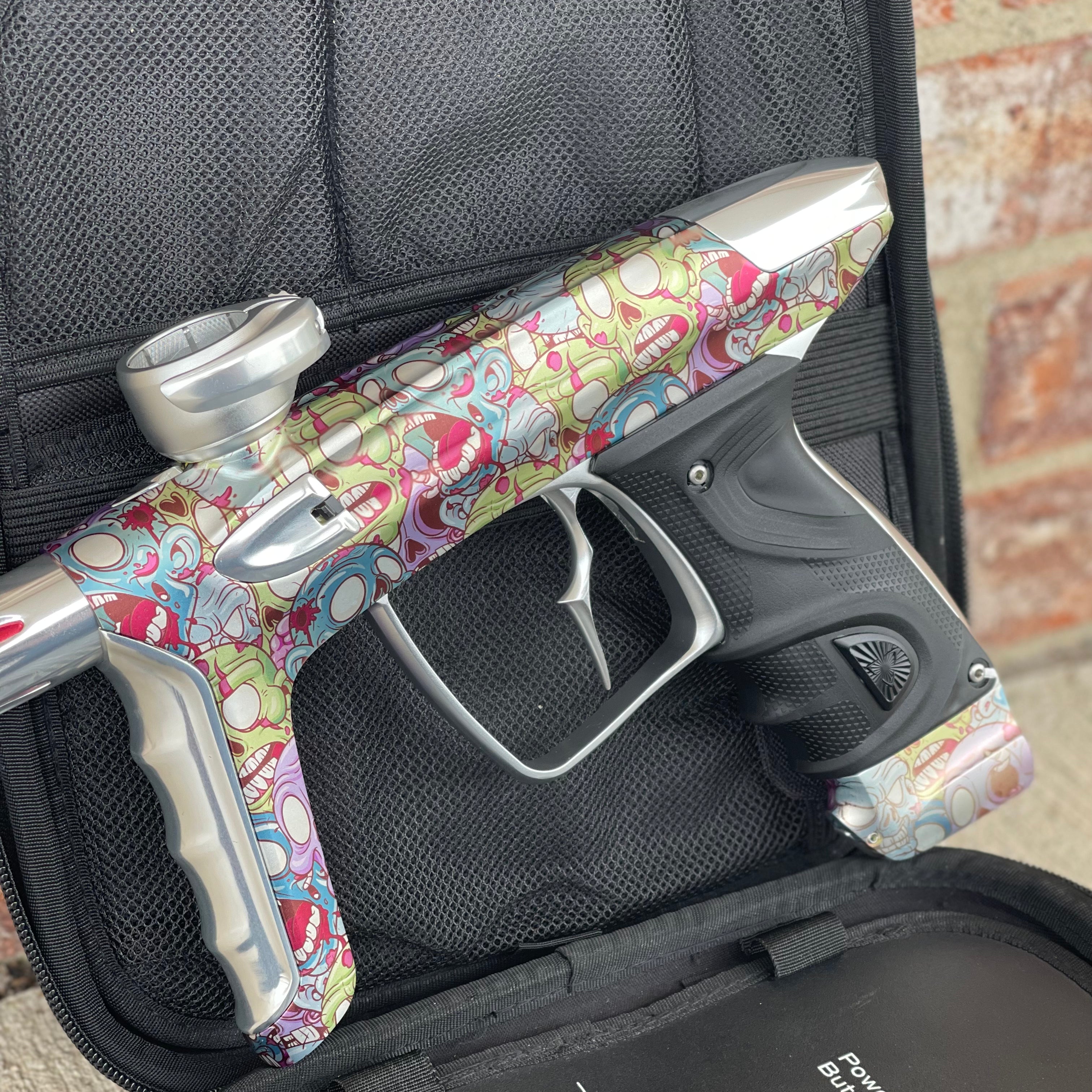 Used DLX Luxe TM40 Paintball Gun - LE Zombie Edition w/Silver Deuce Trigger & Wireless Charger