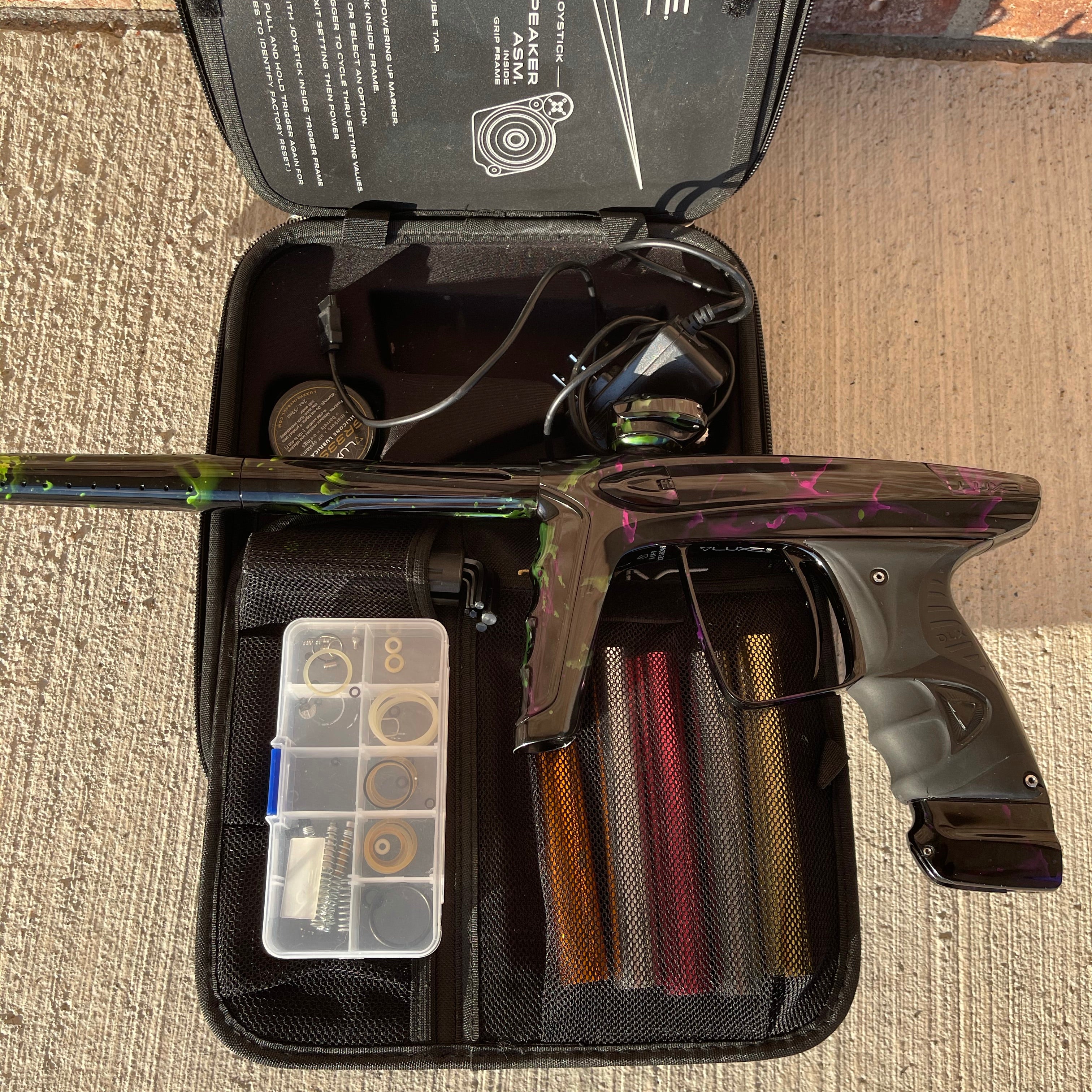 Used DLX Luxe Ice Paintball Gun - Acid Wash Green / Purple