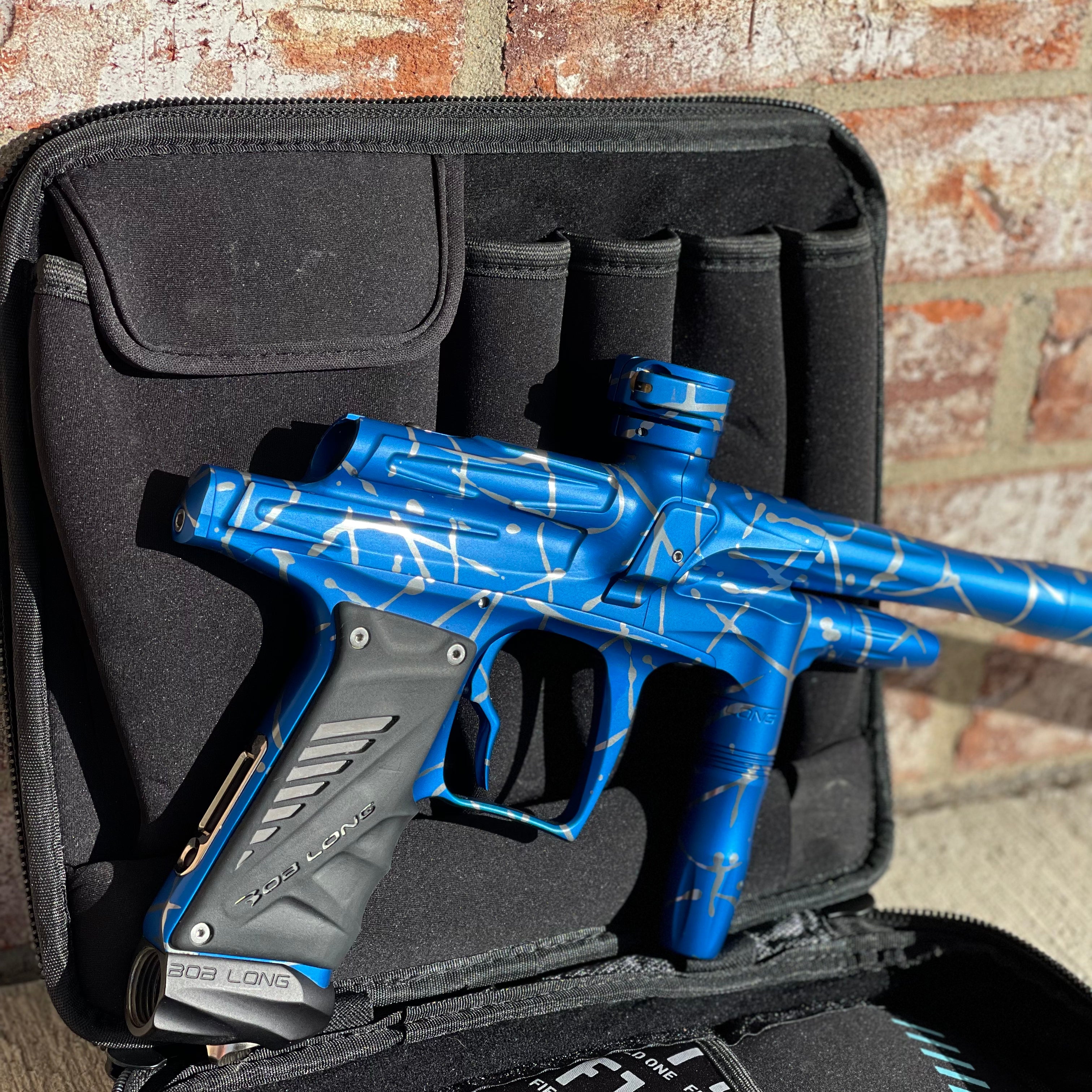 Used Bob Long G6R OLED Paintball Gun - Z Cut - Blue/Silver Splash