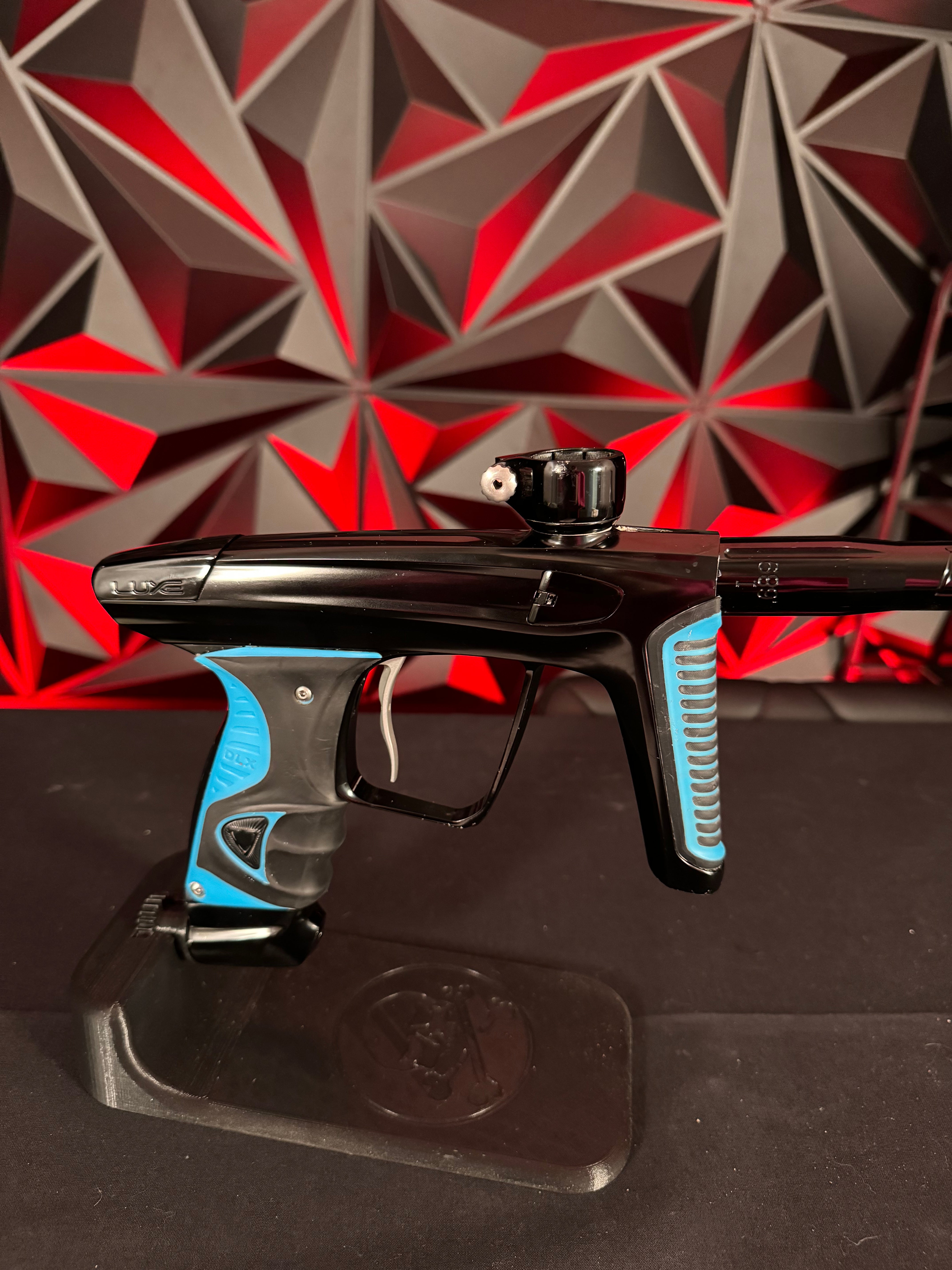 Used DLX Luxe X Paintball Gun - Black w/ Blue Grips