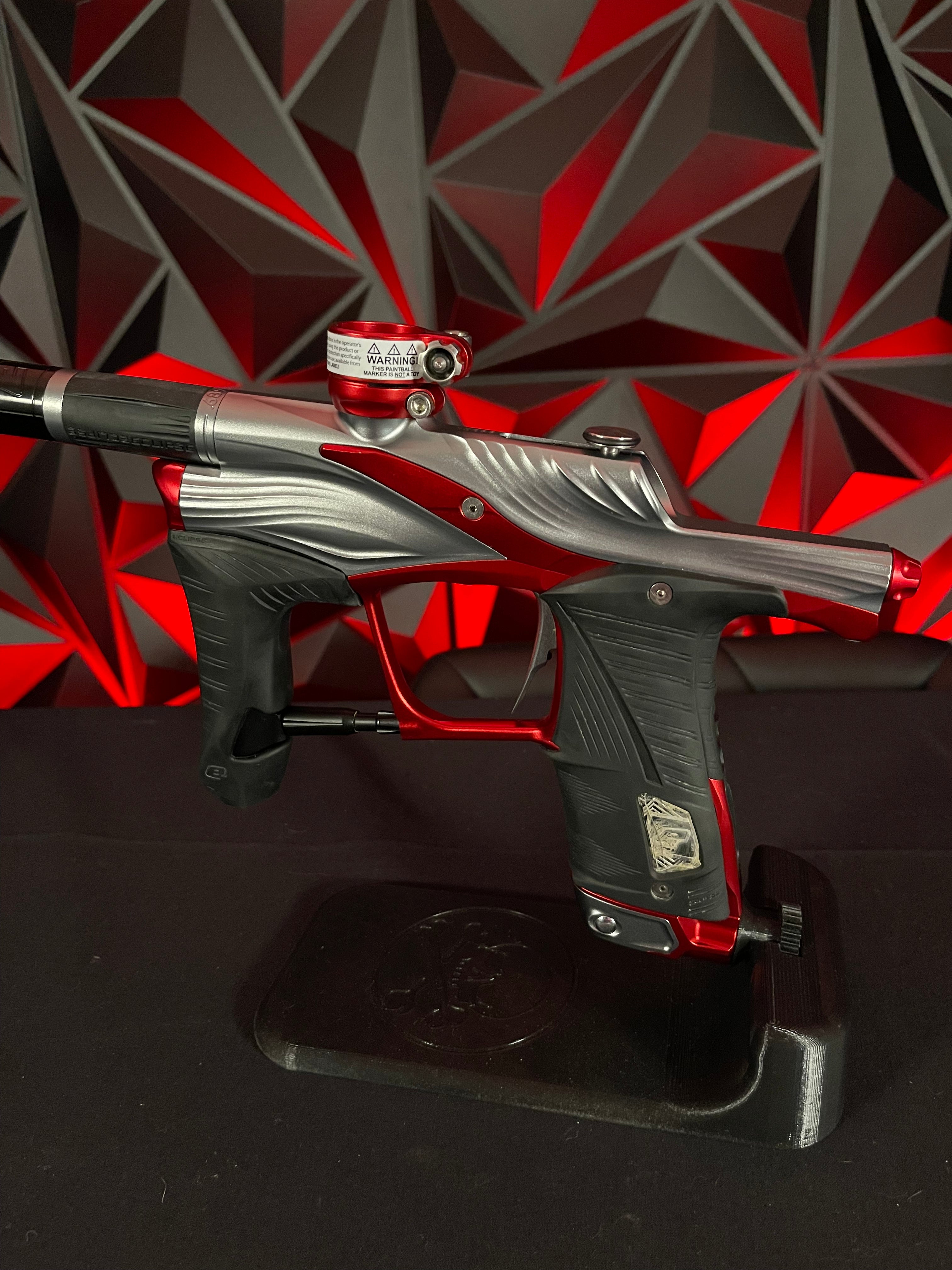 Used Planet Eclipse LV1.6 Paintball Gun - Teahupo Silver/Red w/Deuce Trigger, SSC Bolt, SSC Spare Parts Kit